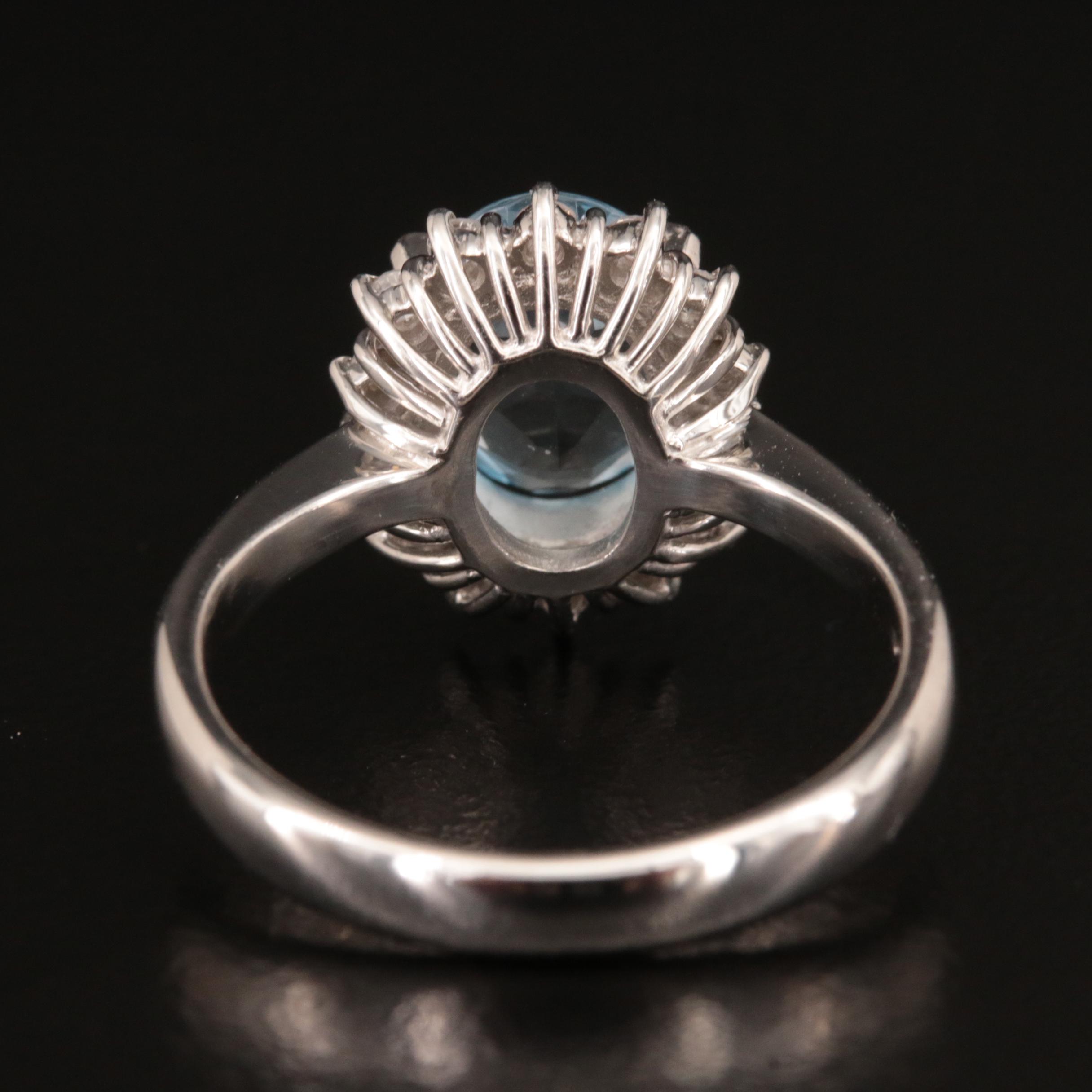 Platinum 1.74 CT Aquamarine and Diamond Halo Ring