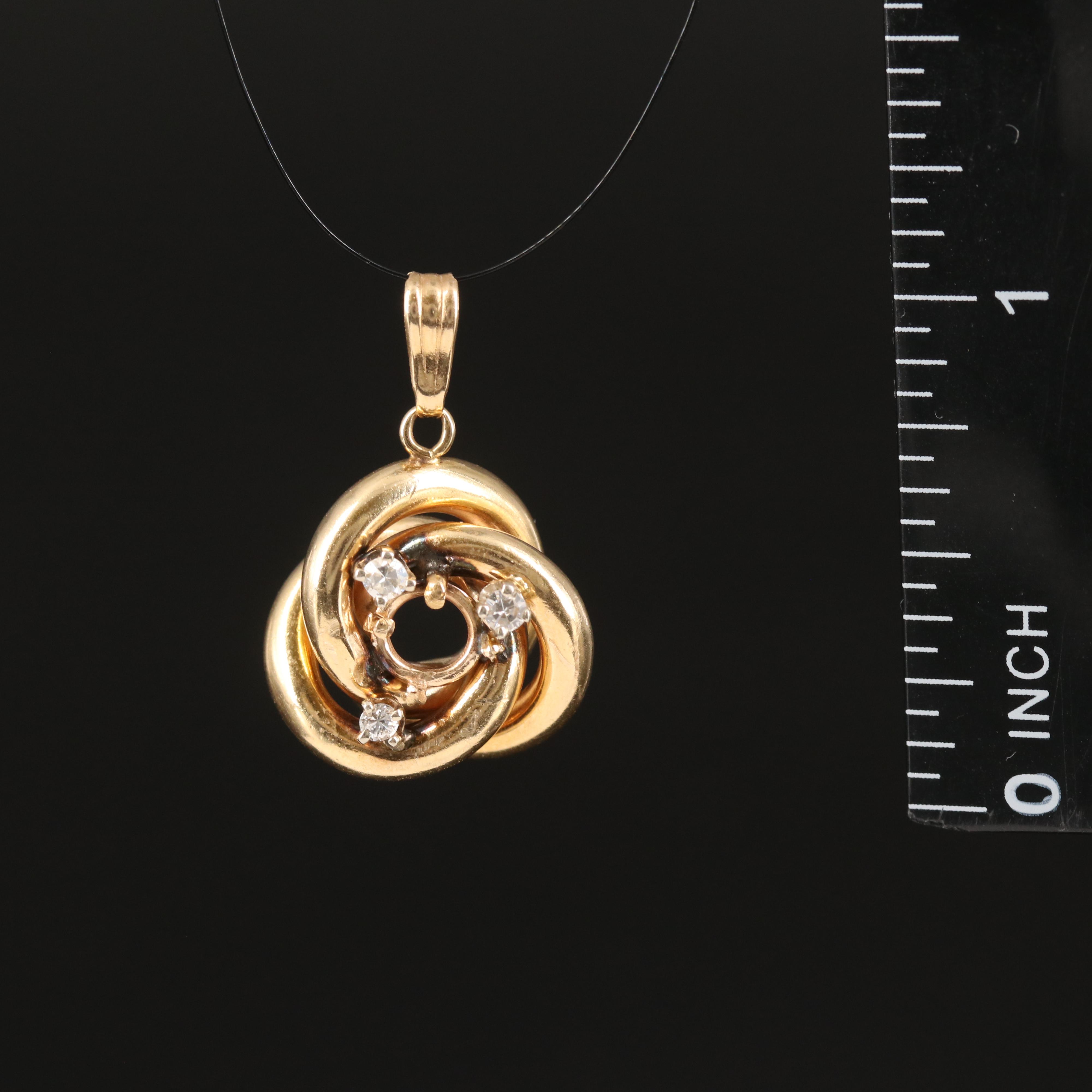14K 0.09 CTW Diamond Love Knot Pendant