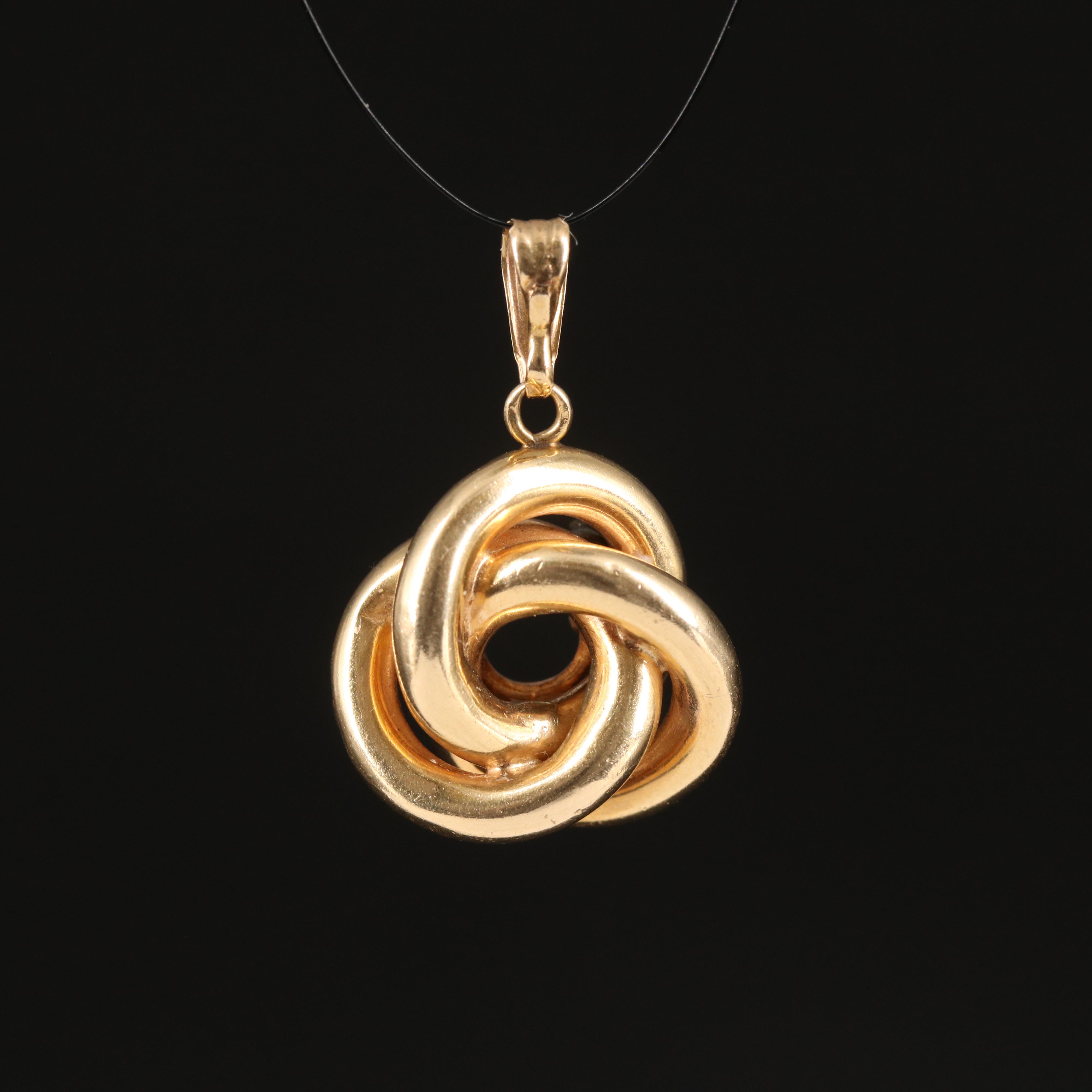 14K 0.09 CTW Diamond Love Knot Pendant