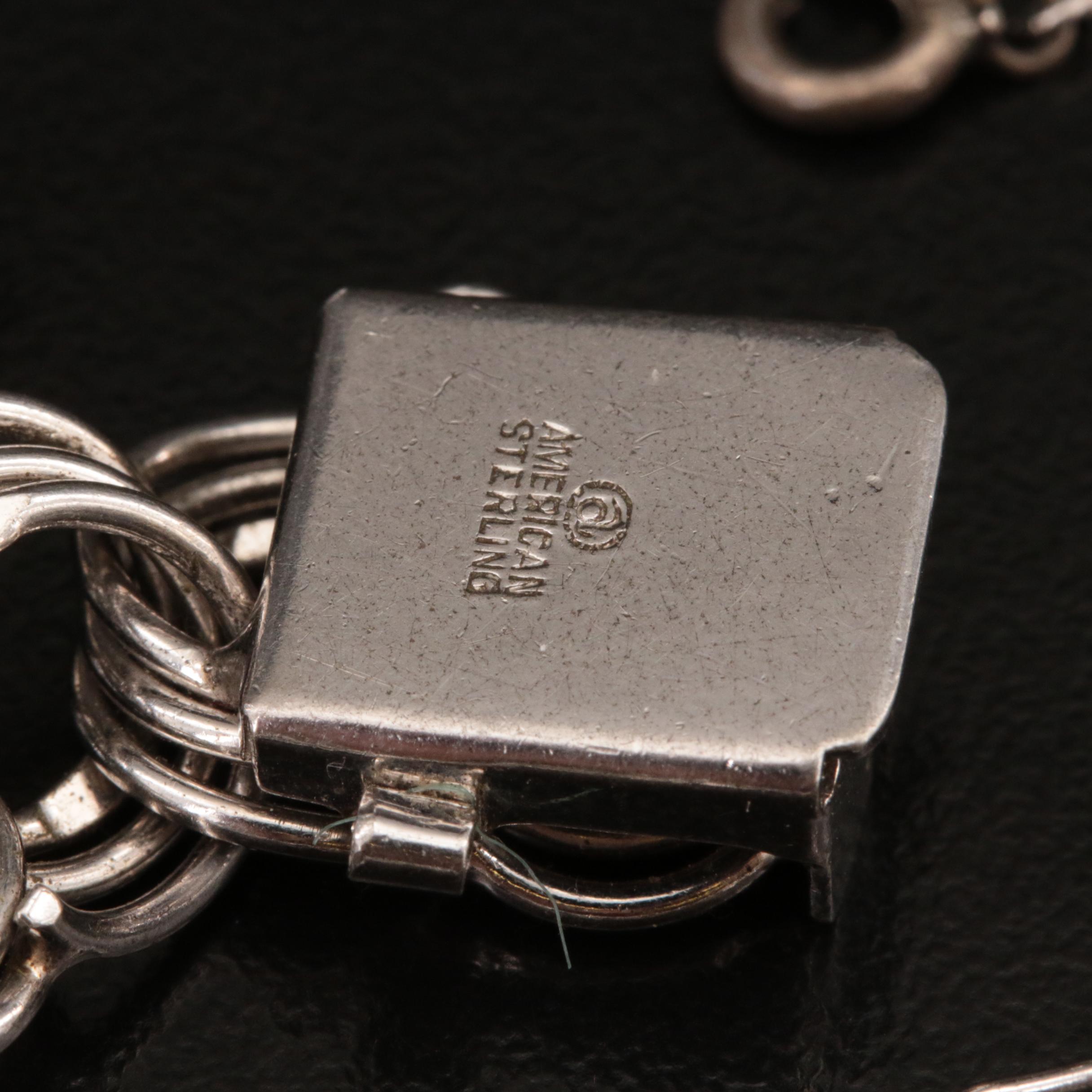 Sterling and 835 Silver Charm Bracelet with Enamel Accents