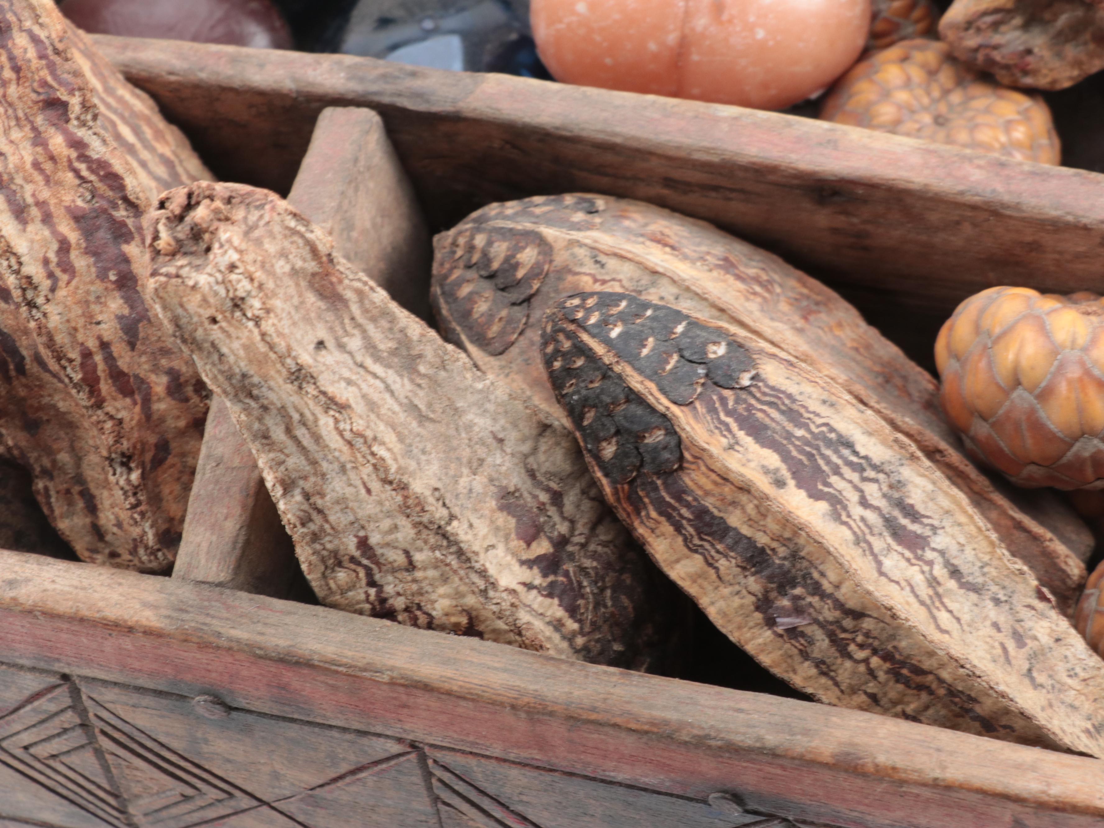 Polychromed and Incised Tiered Box with Seed Pods, Marble and Glass Decor