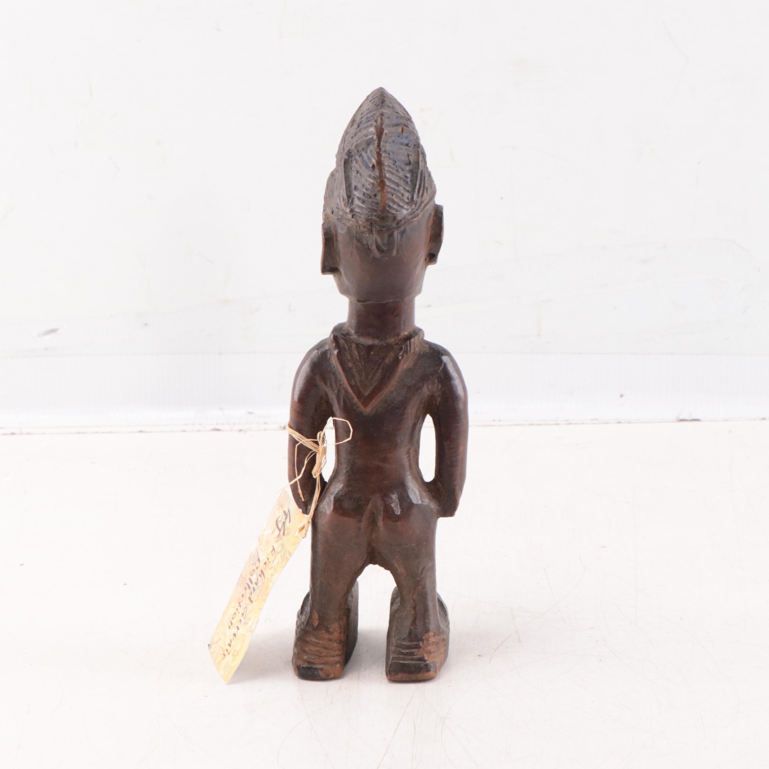 Nigerian Yoruba Carved Wood Ere Ibeji Figure, Mid-20th Century