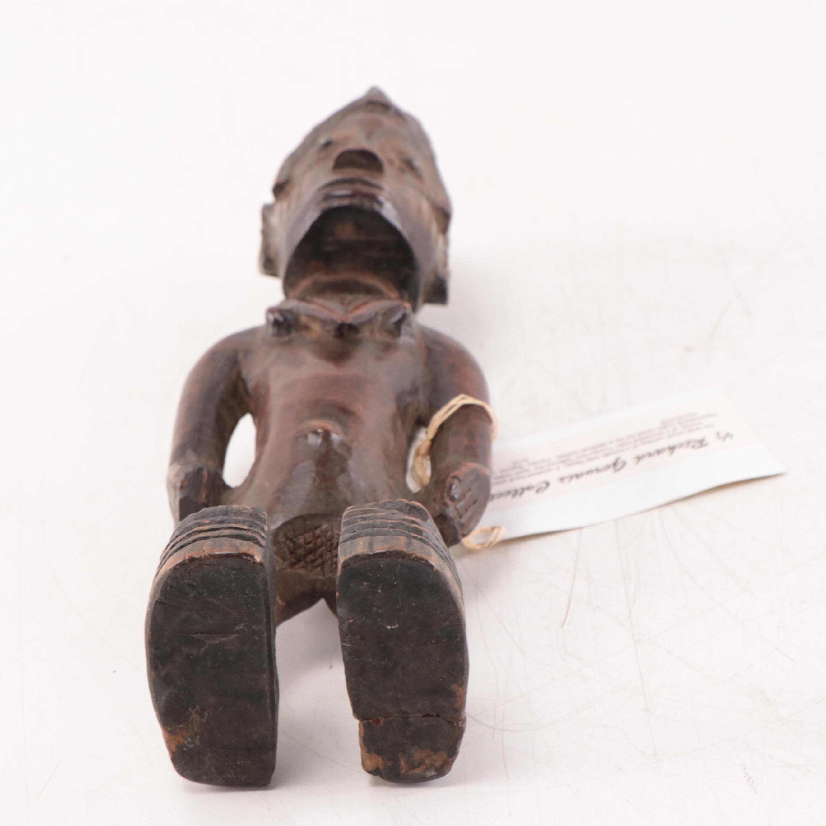 Nigerian Yoruba Carved Wood Ere Ibeji Figure, Mid-20th Century