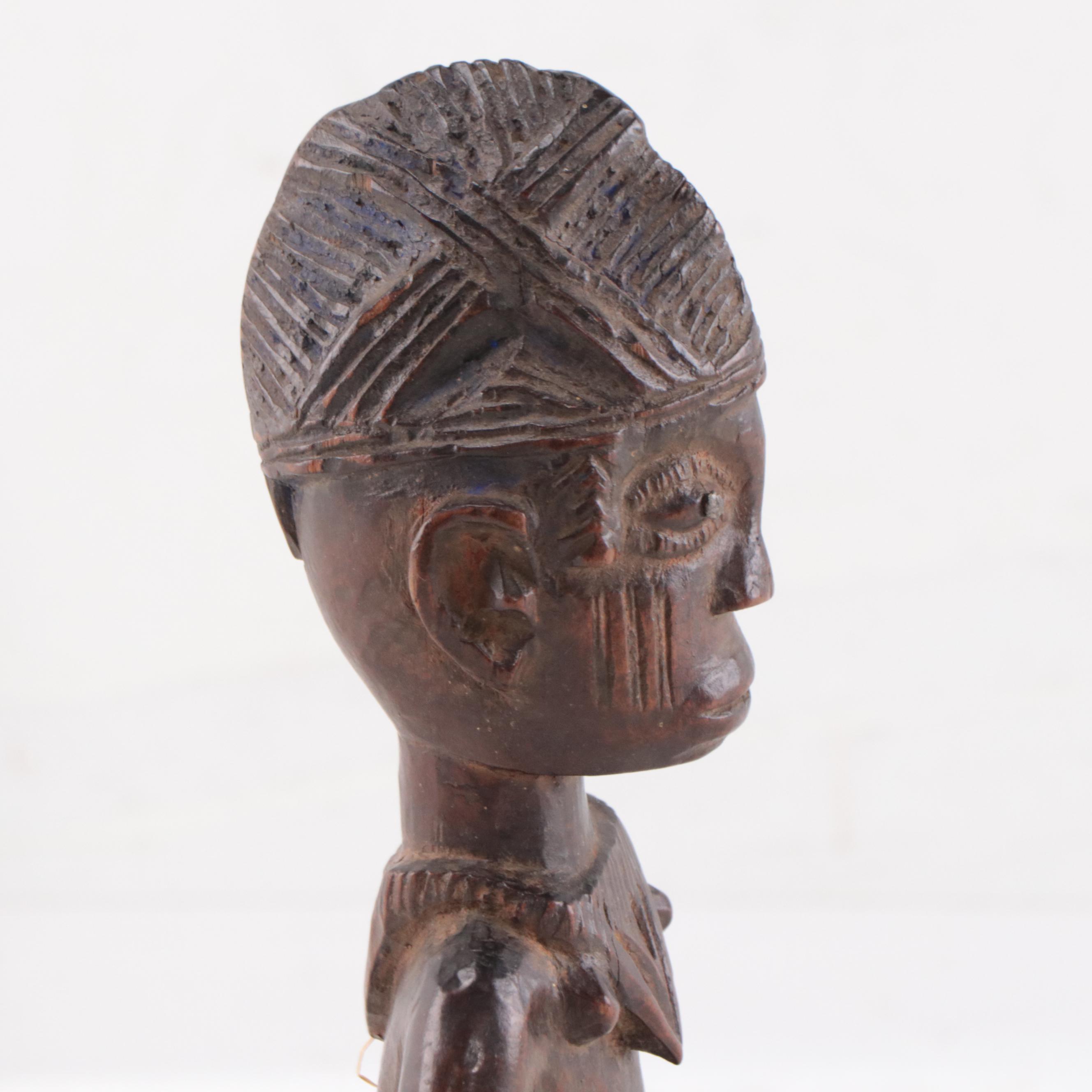 Nigerian Yoruba Carved Wood Ere Ibeji Figure, Mid-20th Century