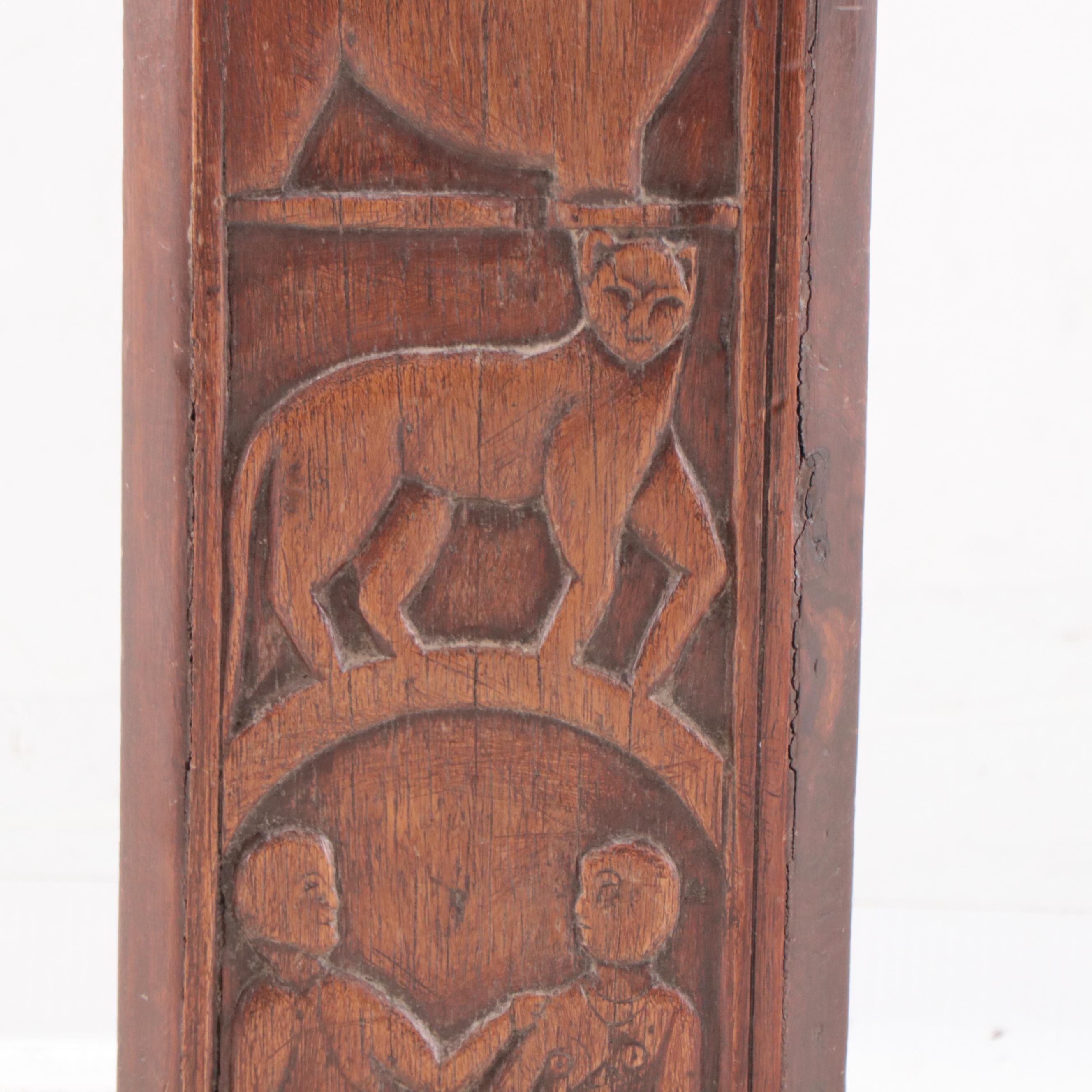 Hand-Carved Wood Sculpture With Figure and Animal Motifs