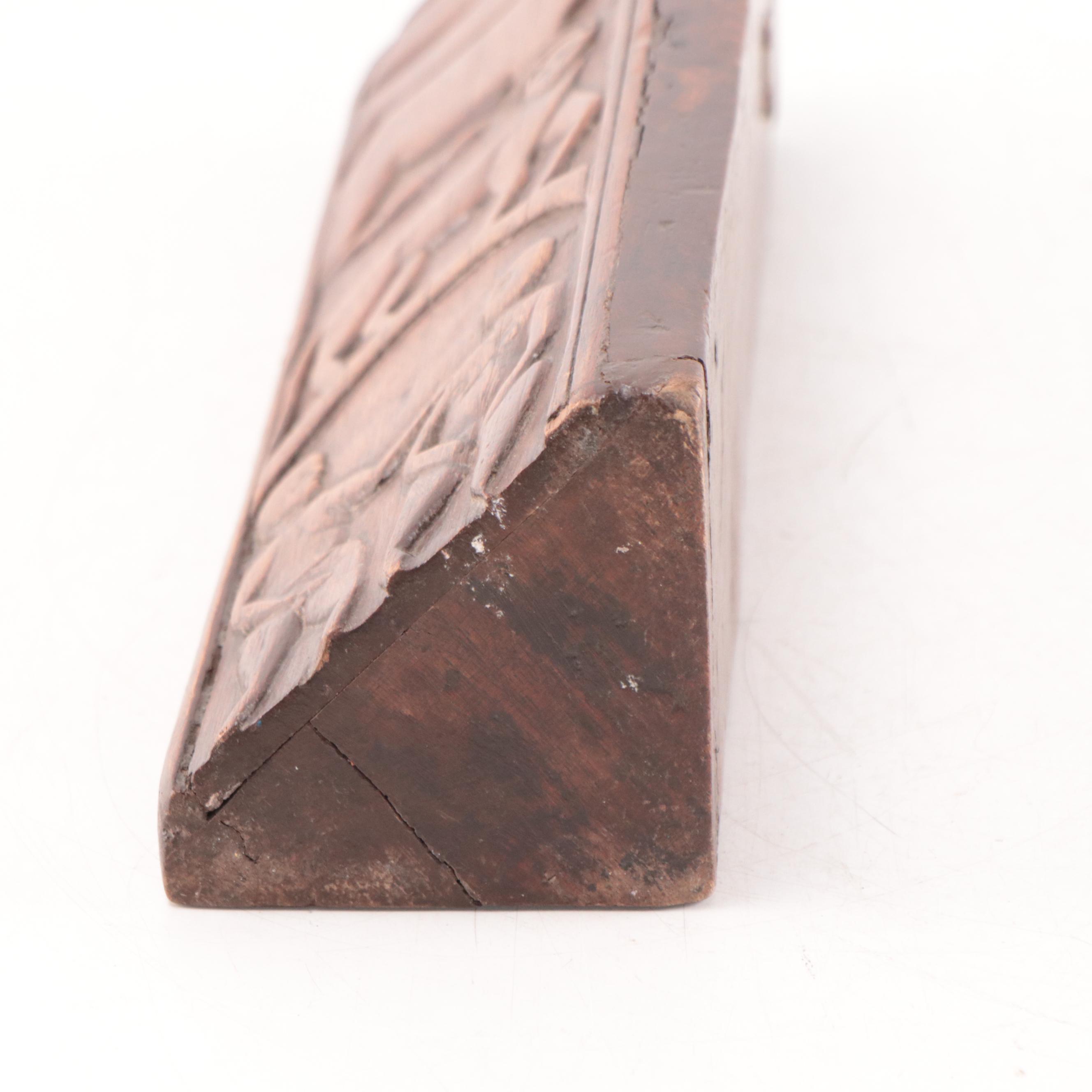 Hand-Carved Wood Sculpture With Figure and Animal Motifs