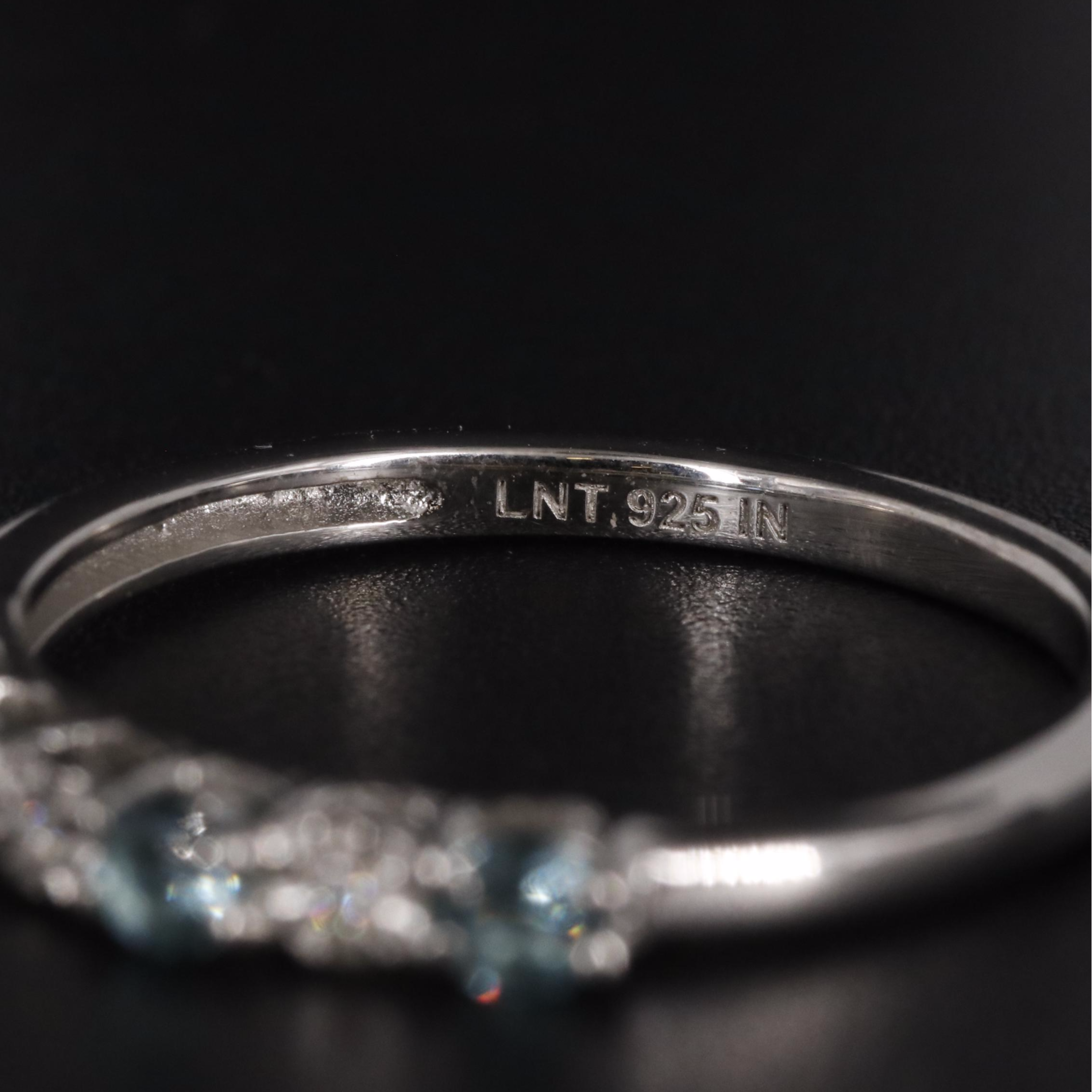 Sterling Light Blue Topaz and Cubic Zirconia Band