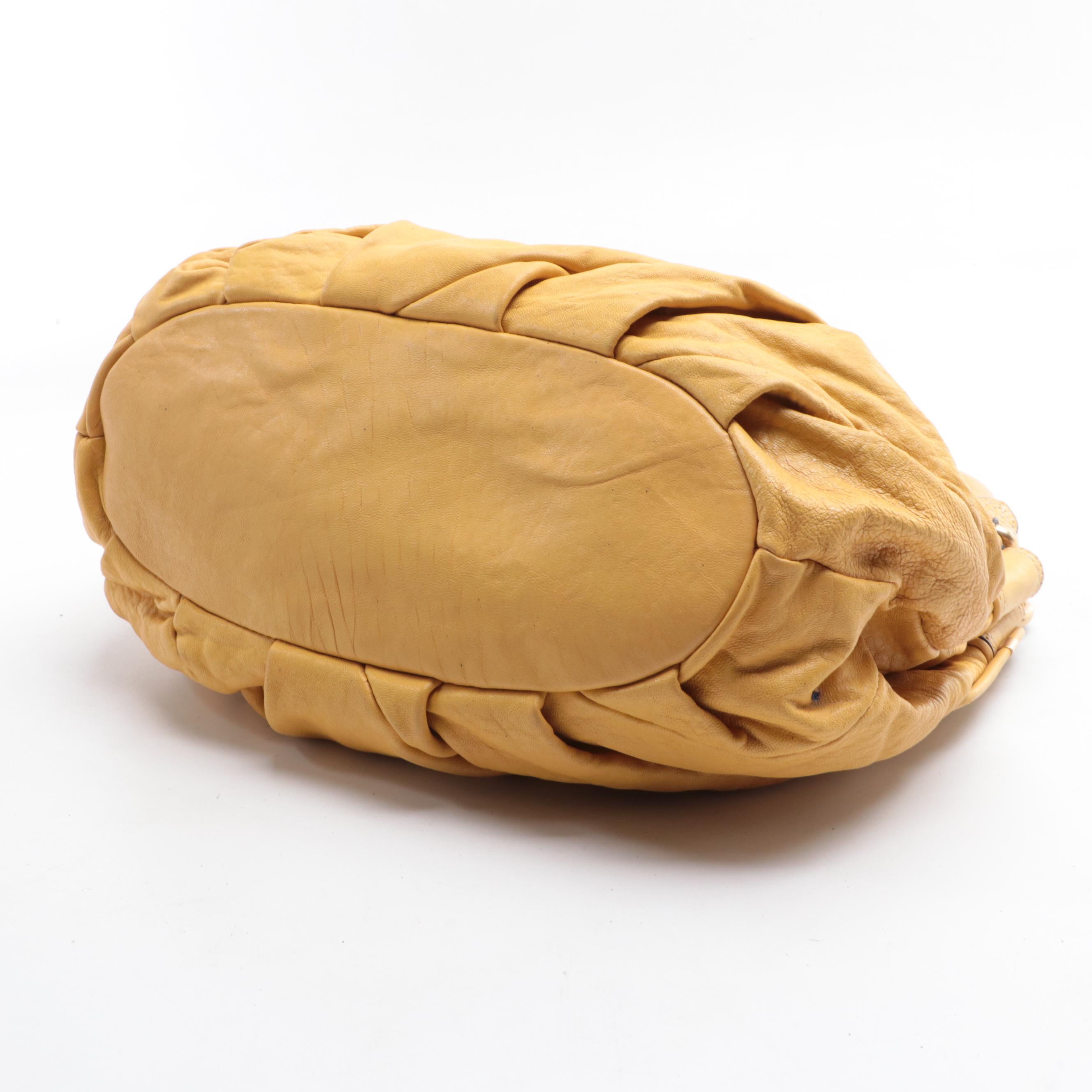 Juicy Couture Leather Hobo and Handbag, Canvas Tote, and Laptop Case