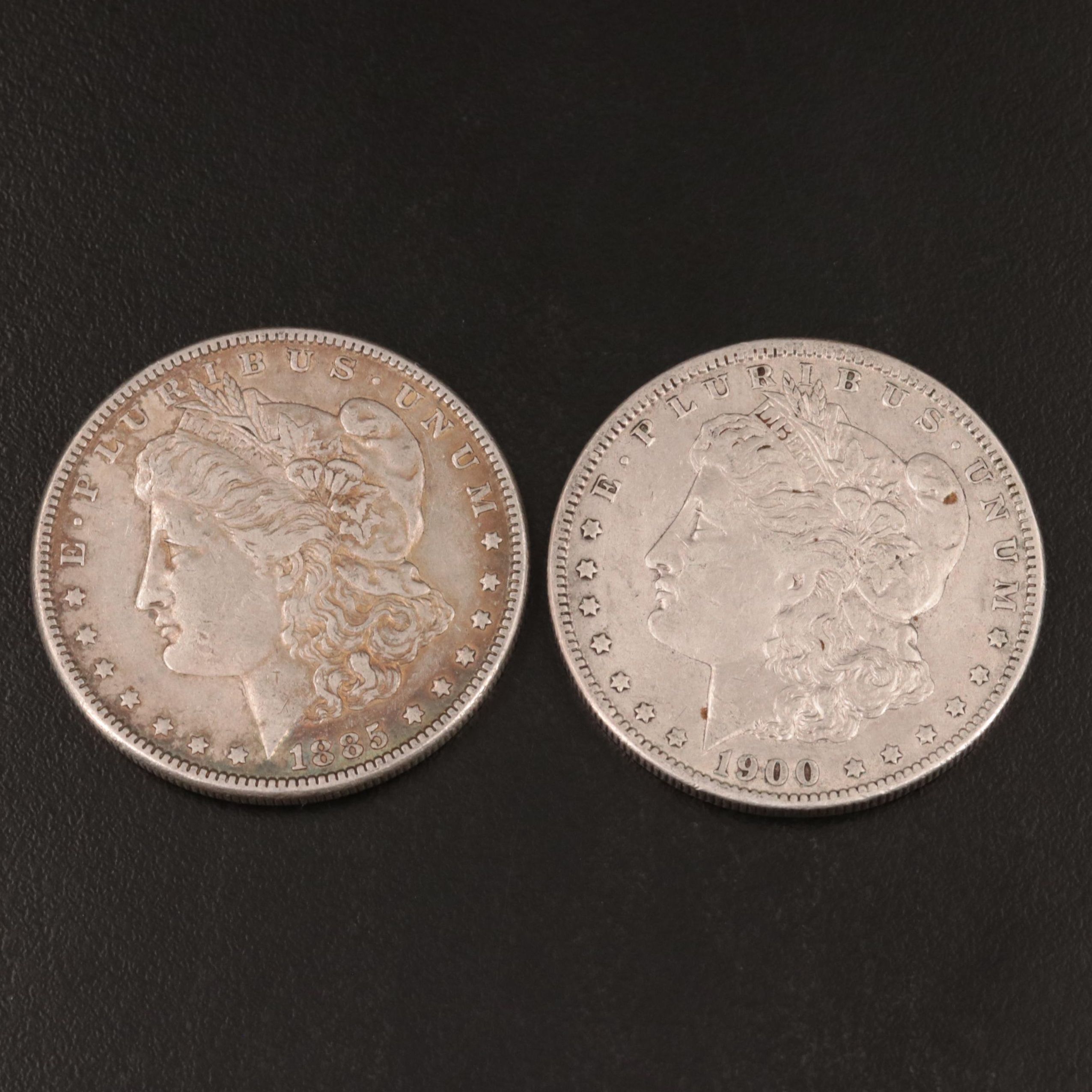 1885 and 1900-O Morgan Silver Dollars