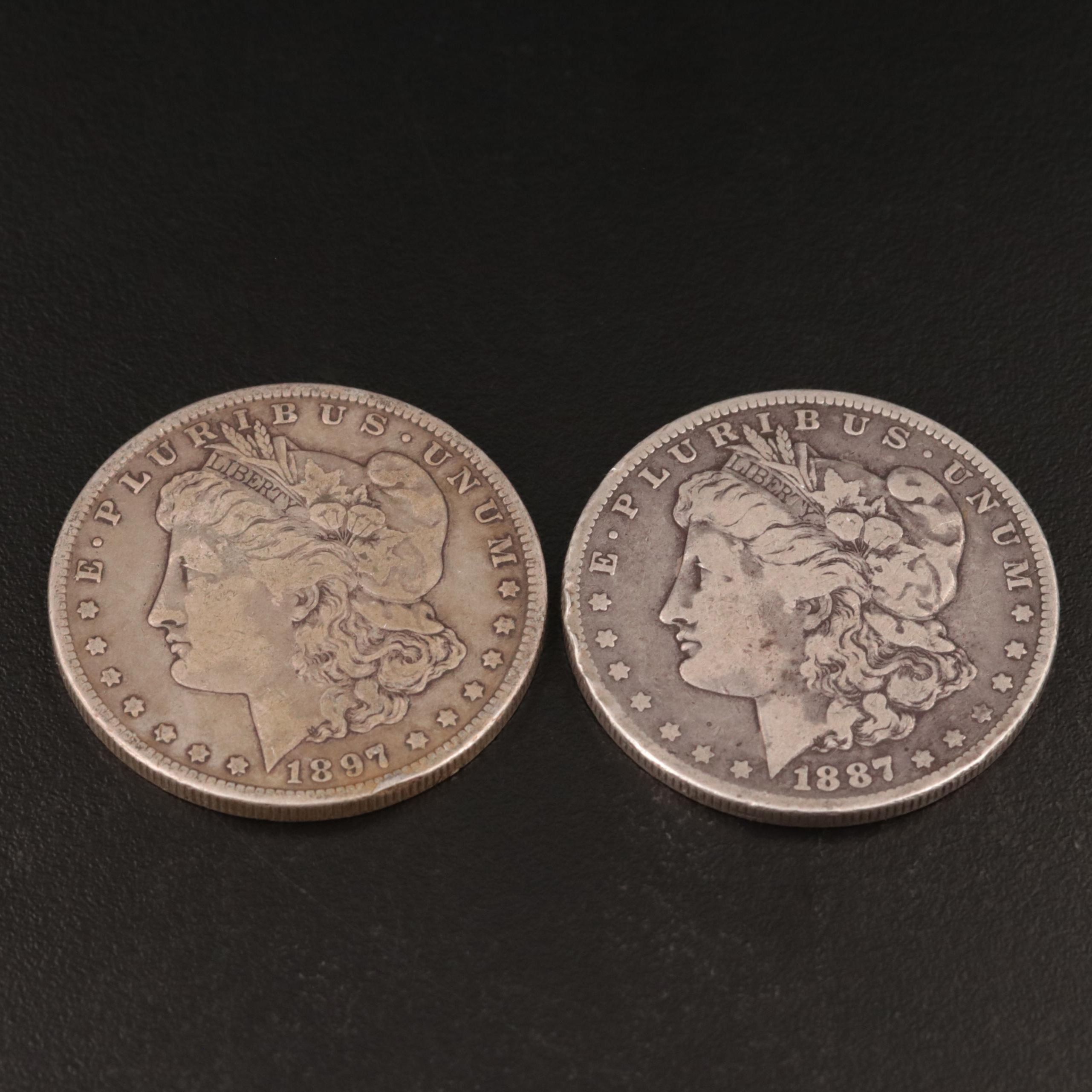 Two Morgan Silver Dollars Including 1887-O