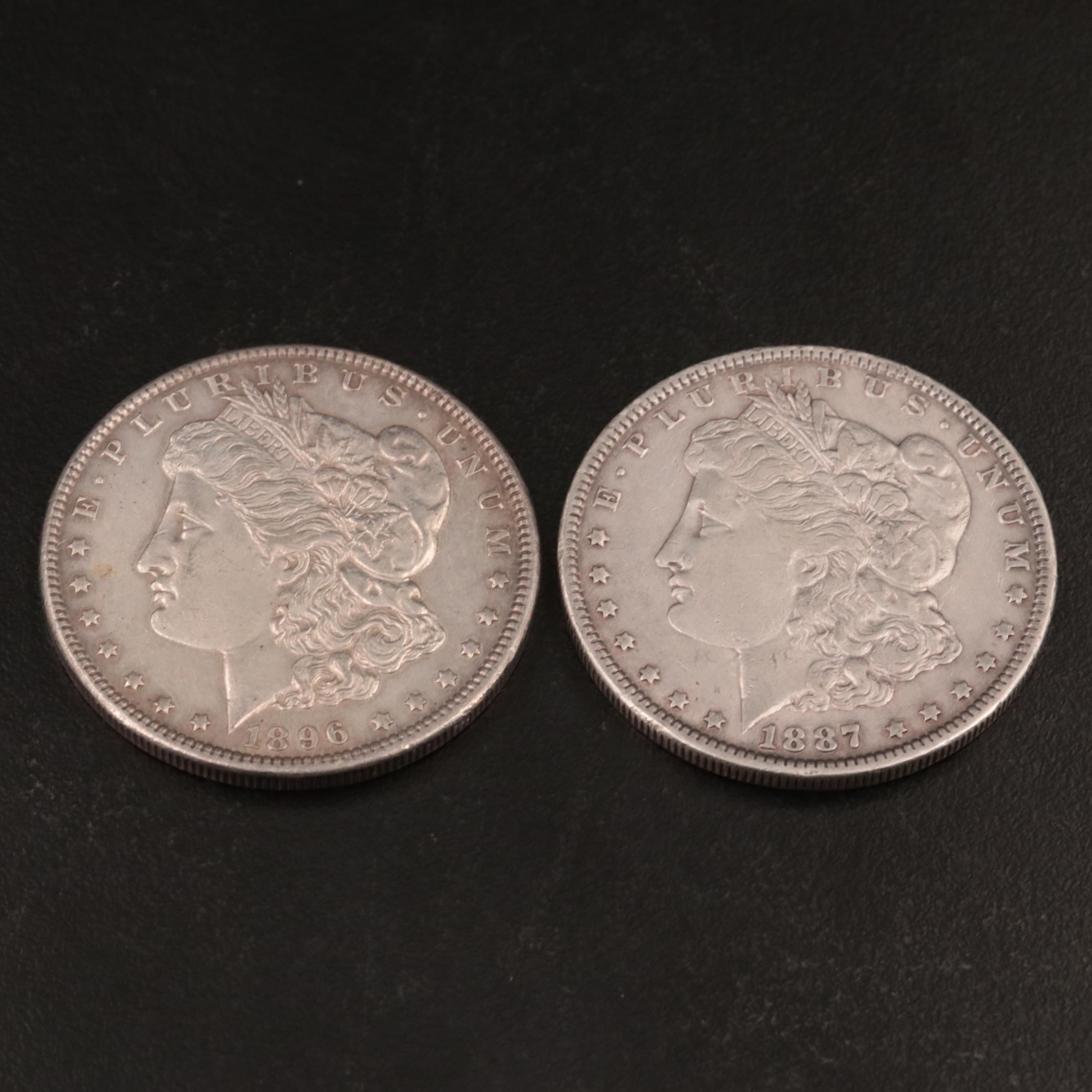 Two Morgan Silver Dollars Including 1887