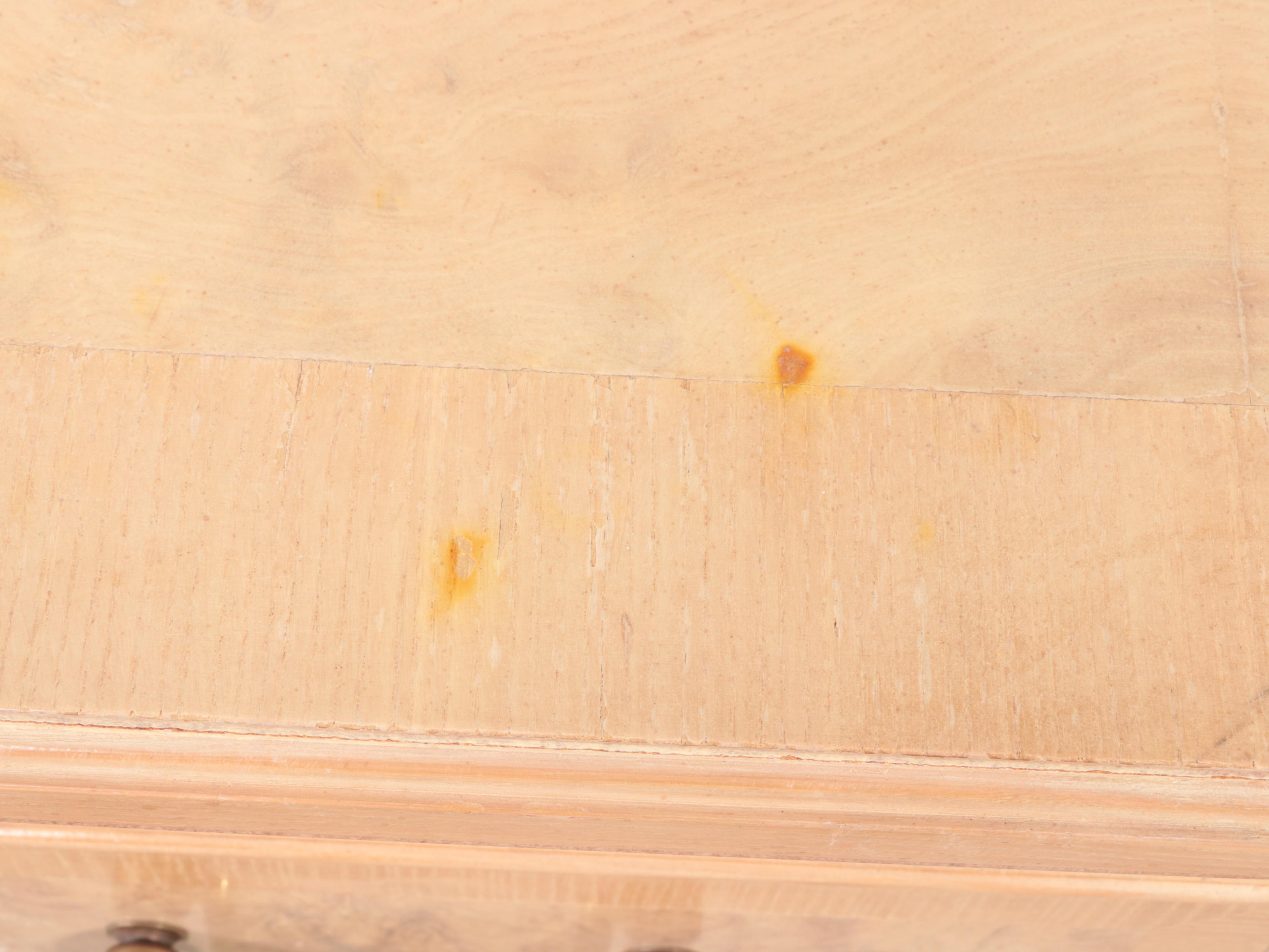 Drexel Heritage "Corinthian" Ash and Olive Ash Burl Nine-Drawer Chest