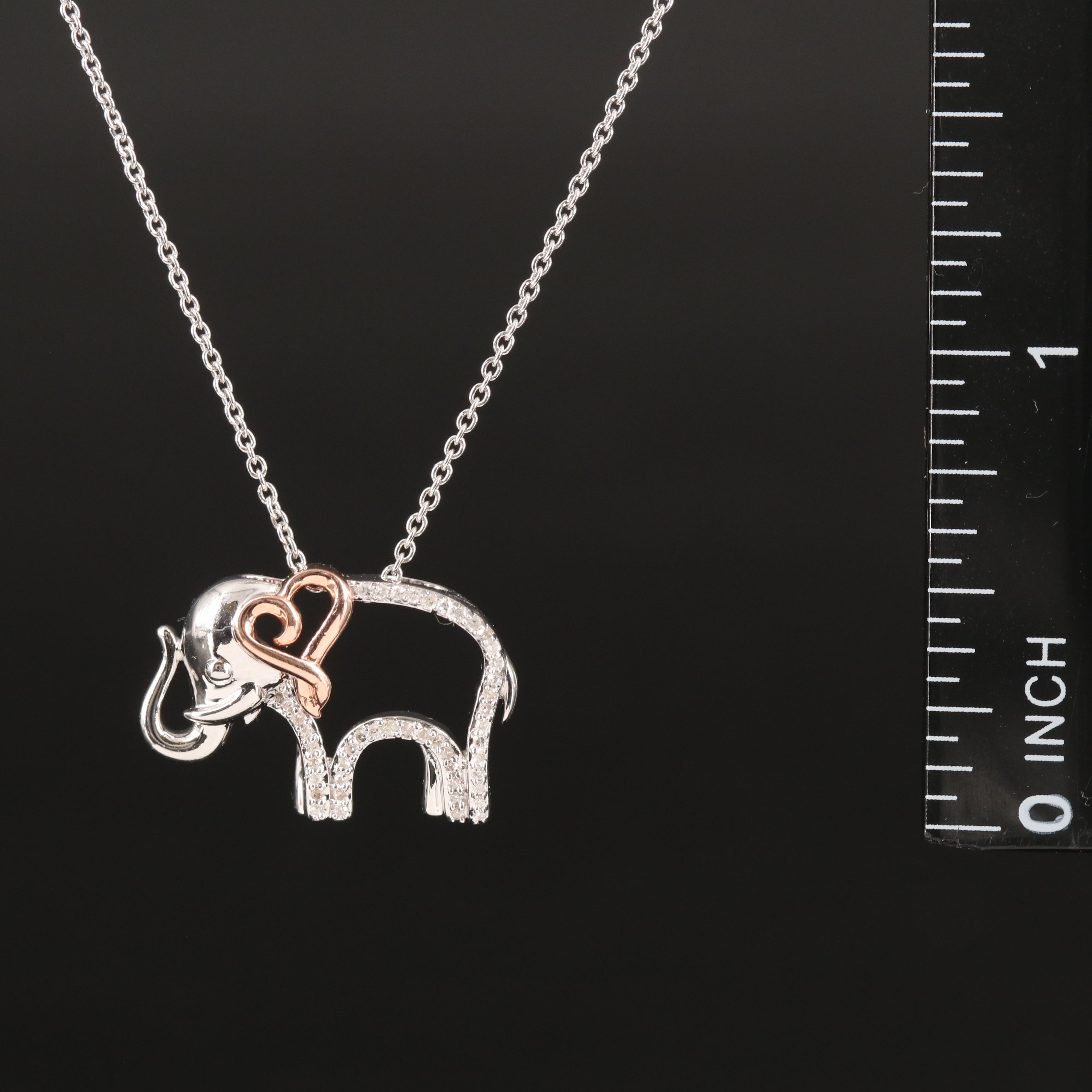 Sterling Diamond Elephant Necklace with Heart Accent