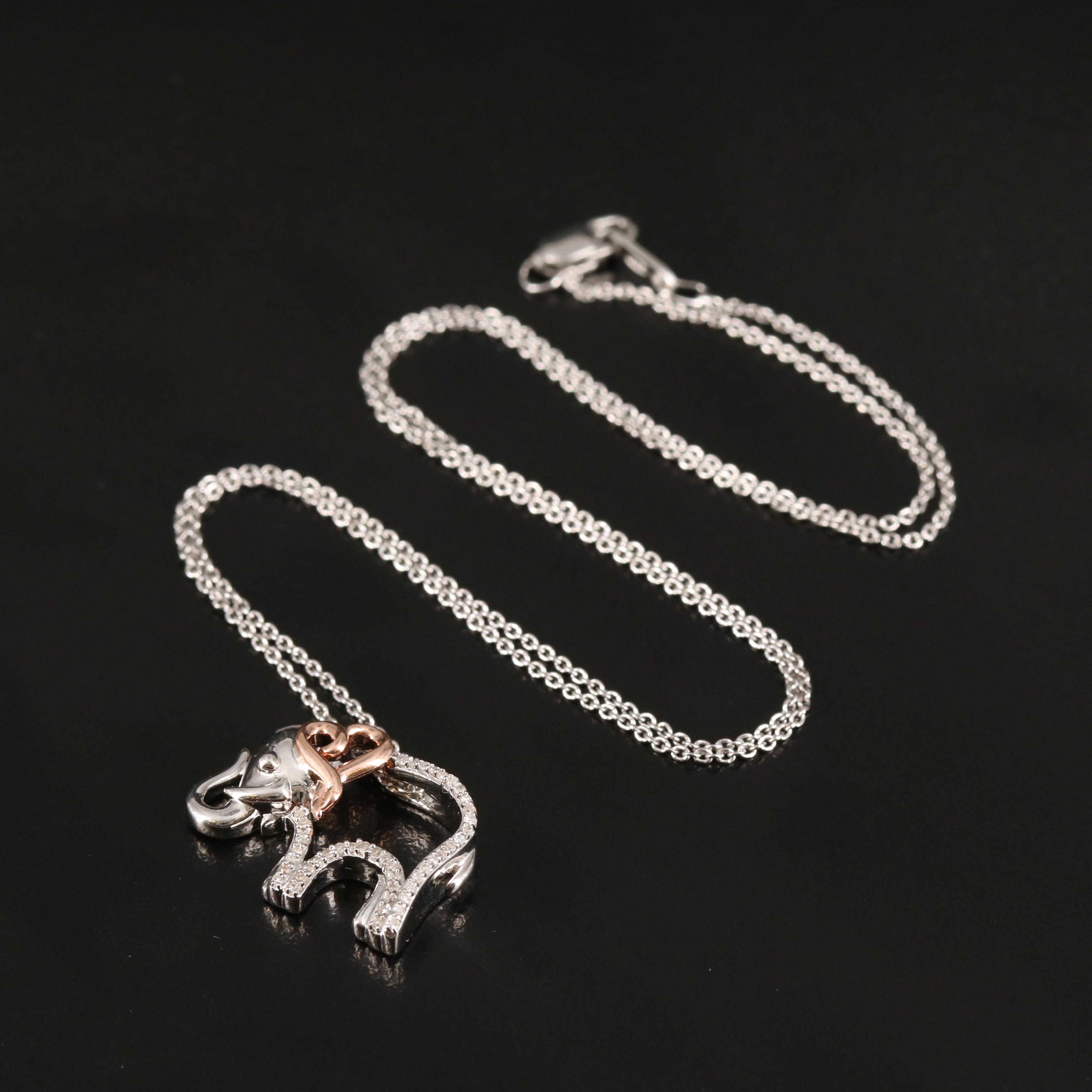 Sterling Diamond Elephant Necklace with Heart Accent