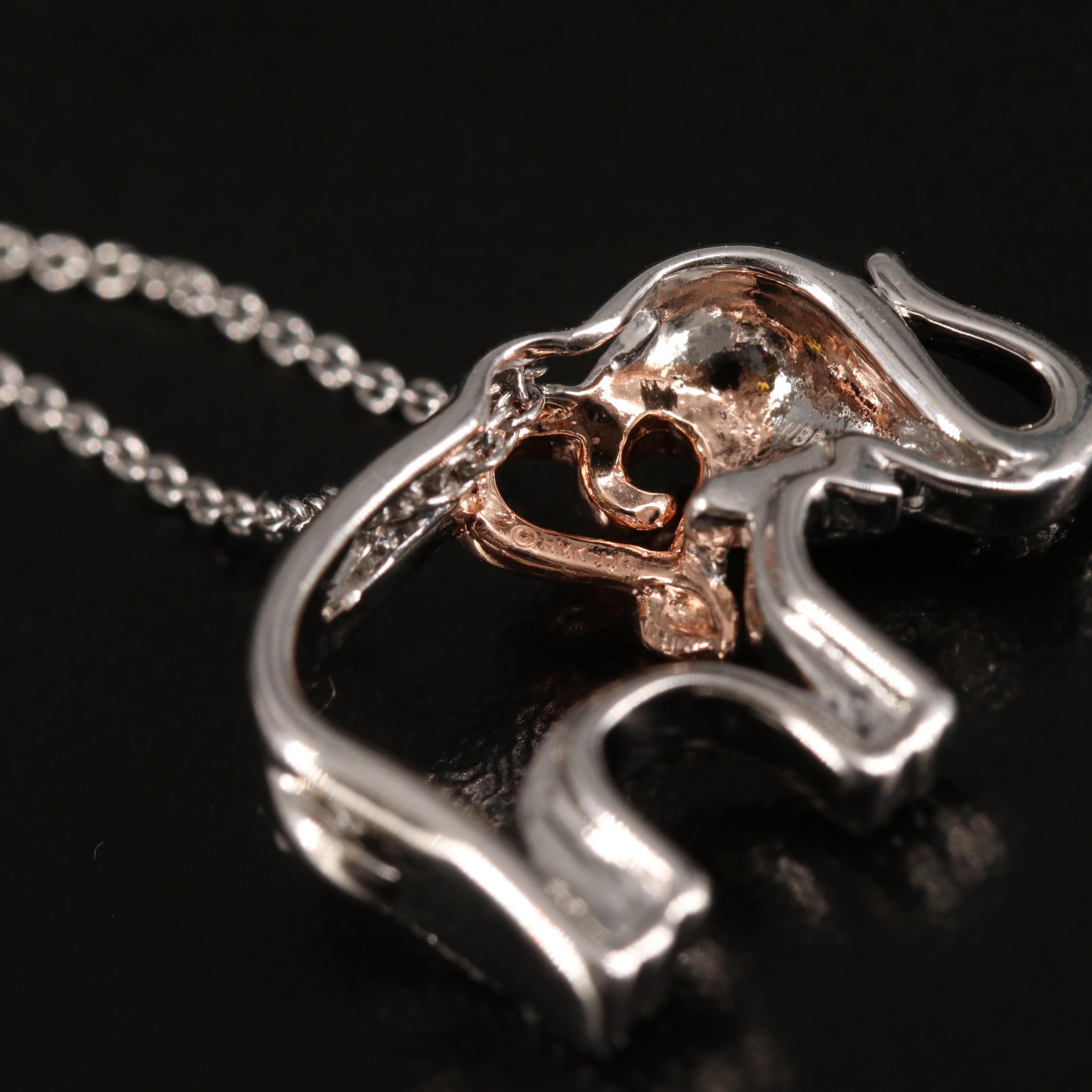 Sterling Diamond Elephant Necklace with Heart Accent