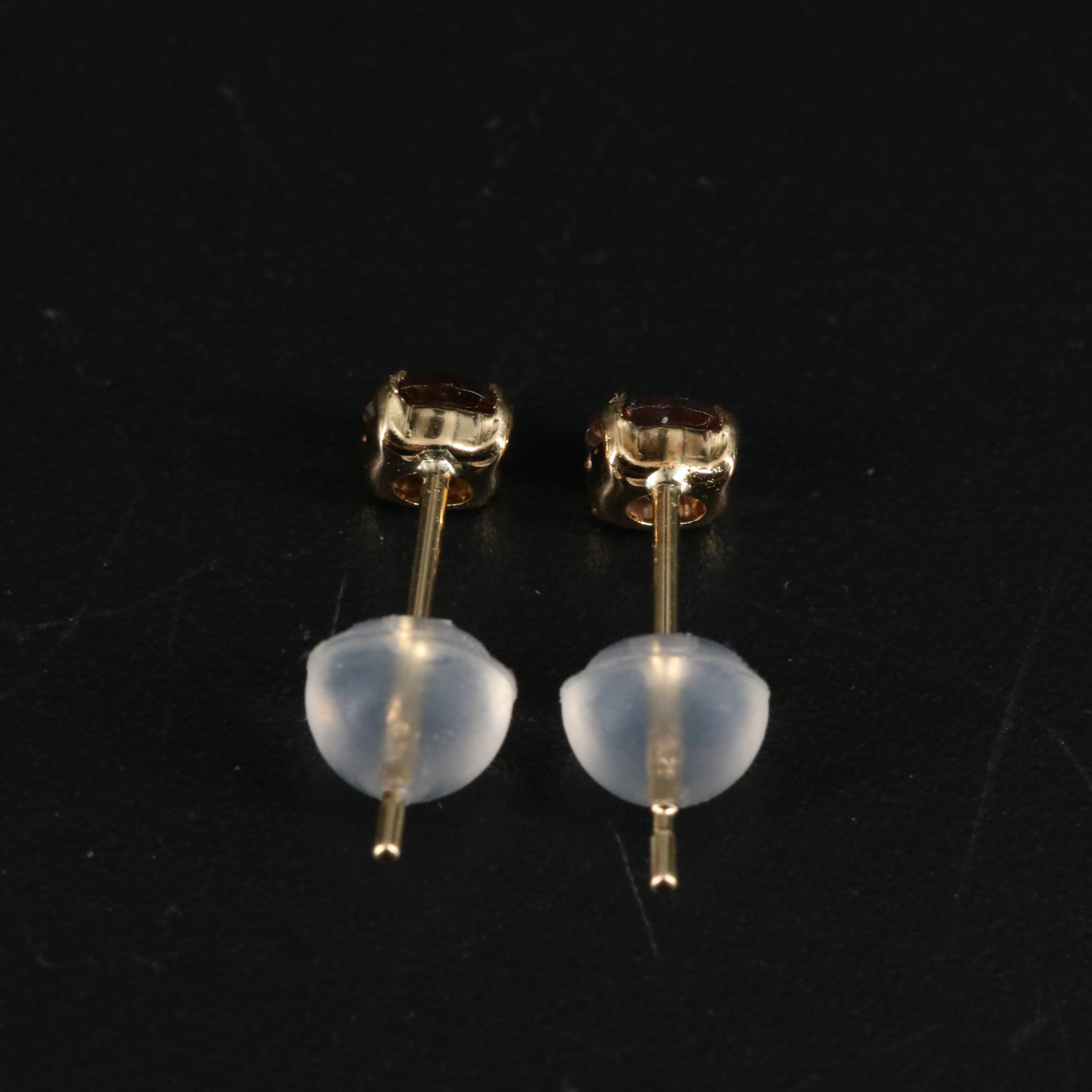 18k 0.40 CTW Color Change Garnet Earrings