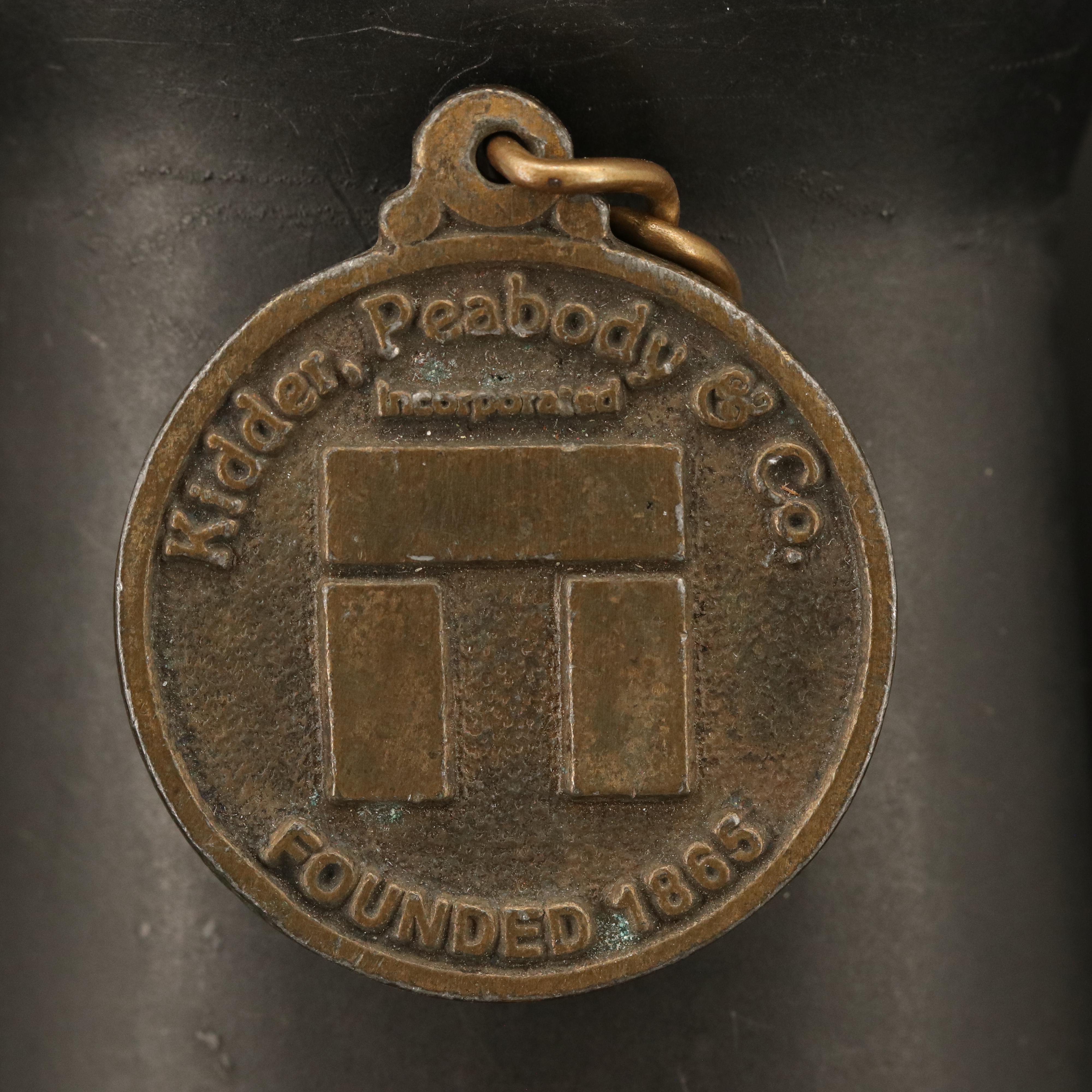 Caravelle and Kidder-Peabody Gold-Tone Watches with Medallion