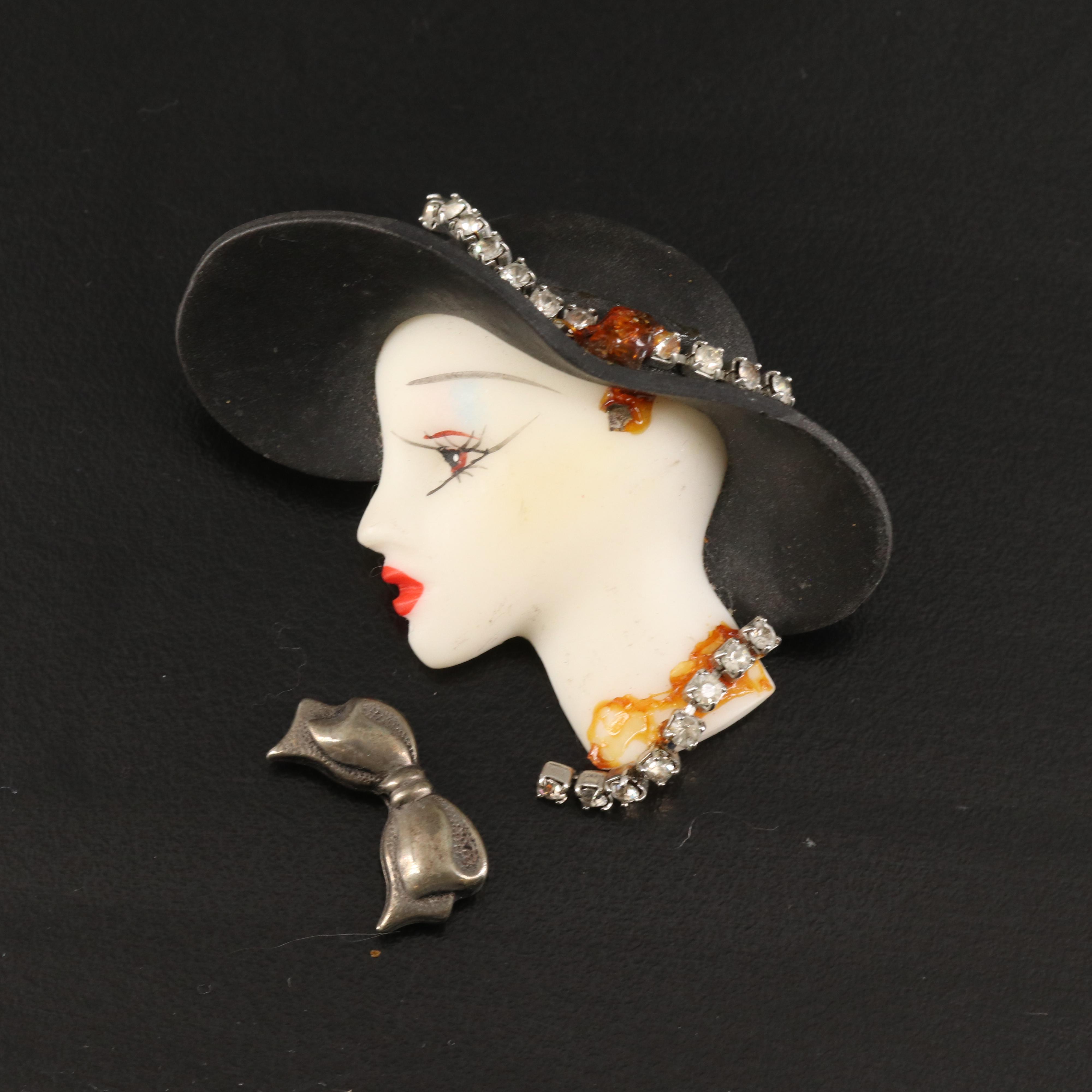 Peacock, Candelabra and Flowers Featured in Vintage Brooch Collection