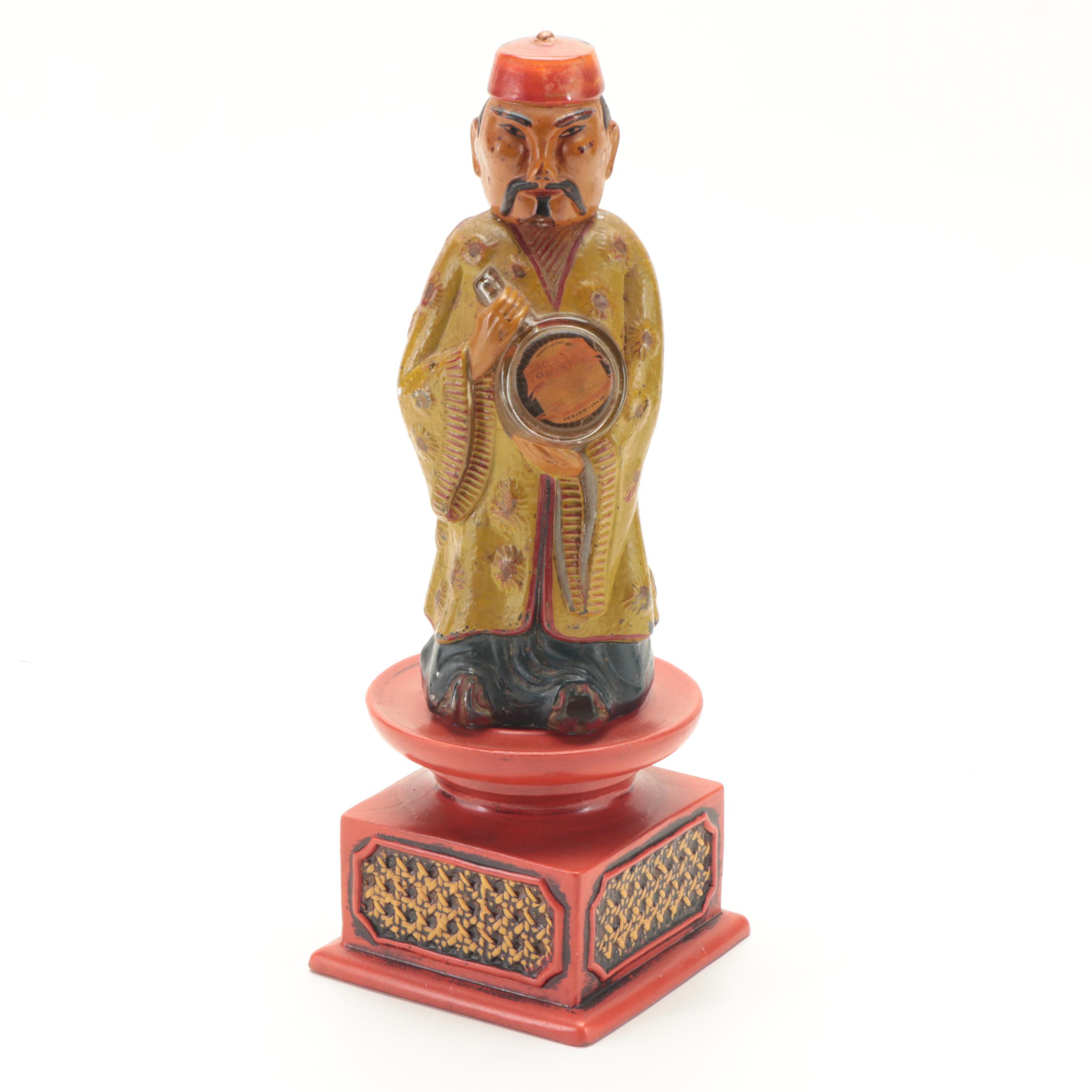 Chinese Style Painted Plaster Candle Holder with Figural Glass Liquor Bottle