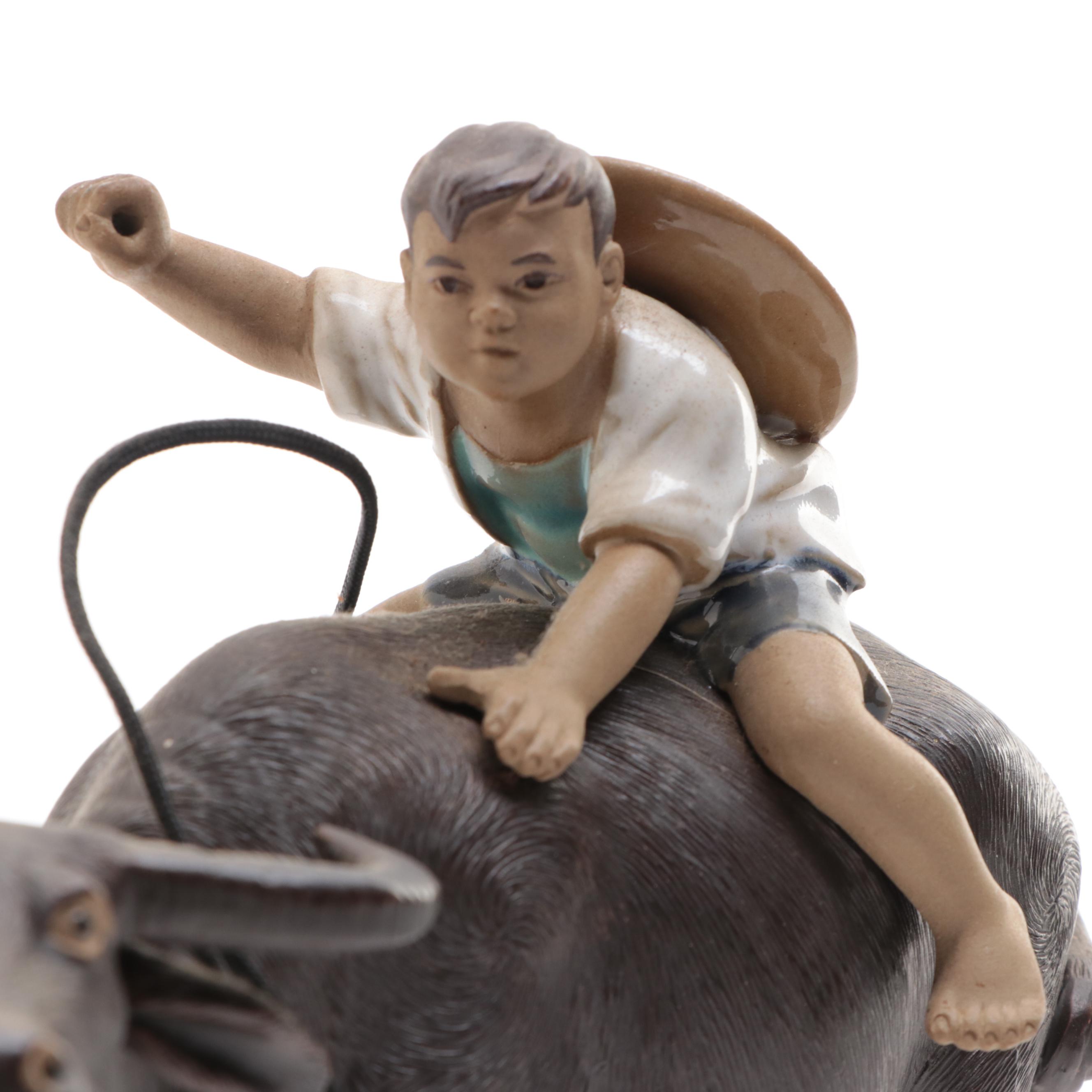Chinese Shiwan Pottery Figurines of Boy and Girl Riding Water Buffalo