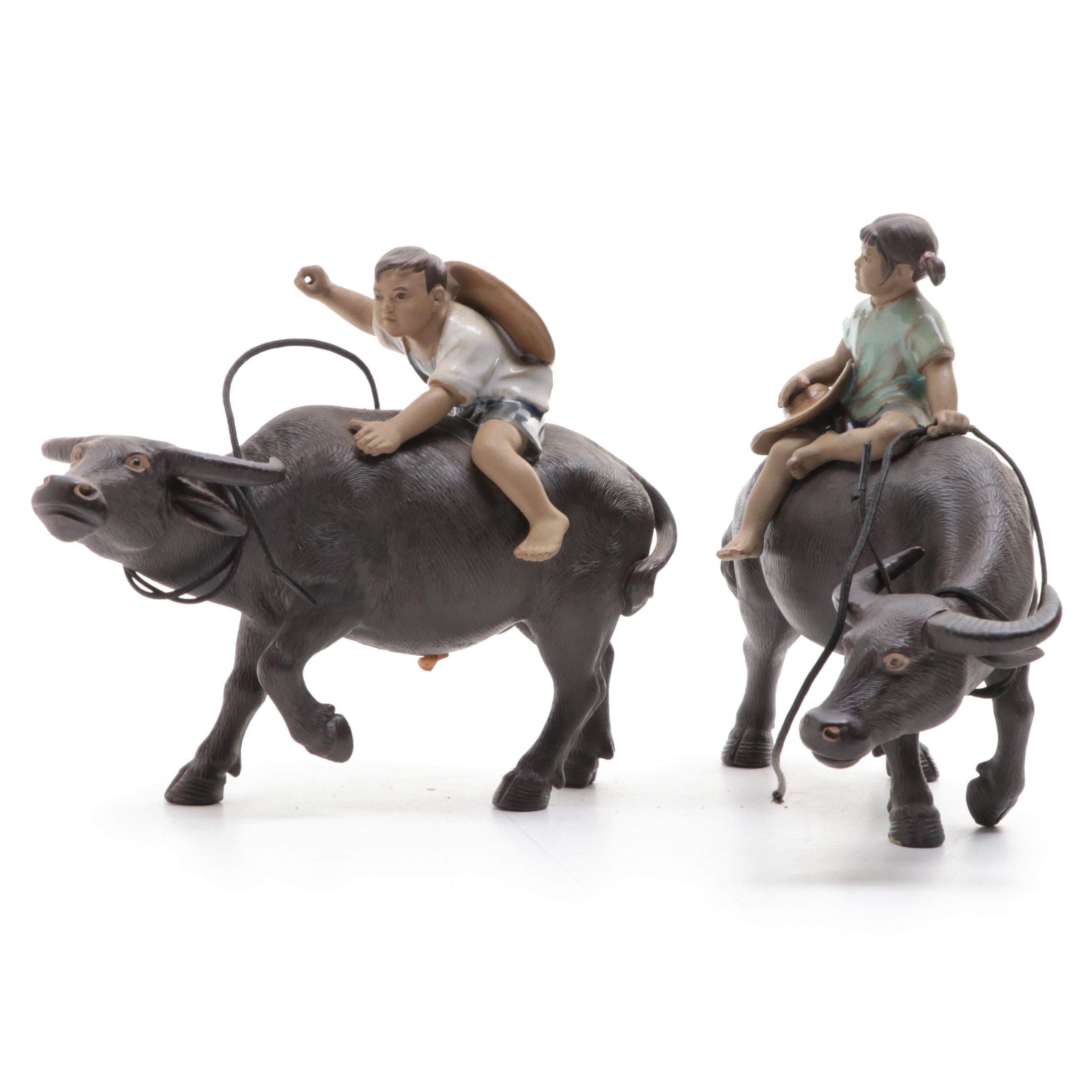 Chinese Shiwan Pottery Figurines of Boy and Girl Riding Water Buffalo