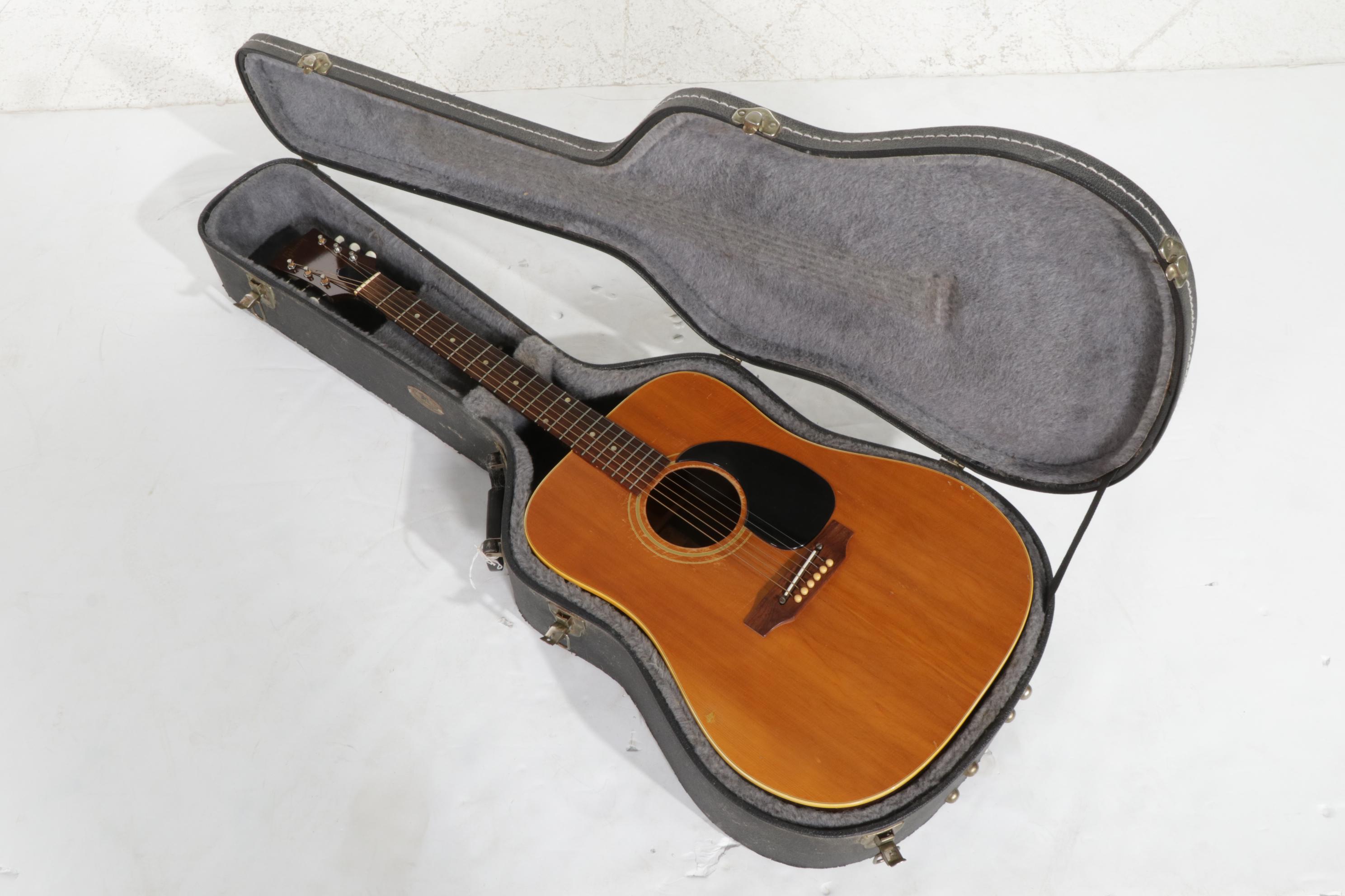 Gibson 6 String Acoustic Guitar in Case