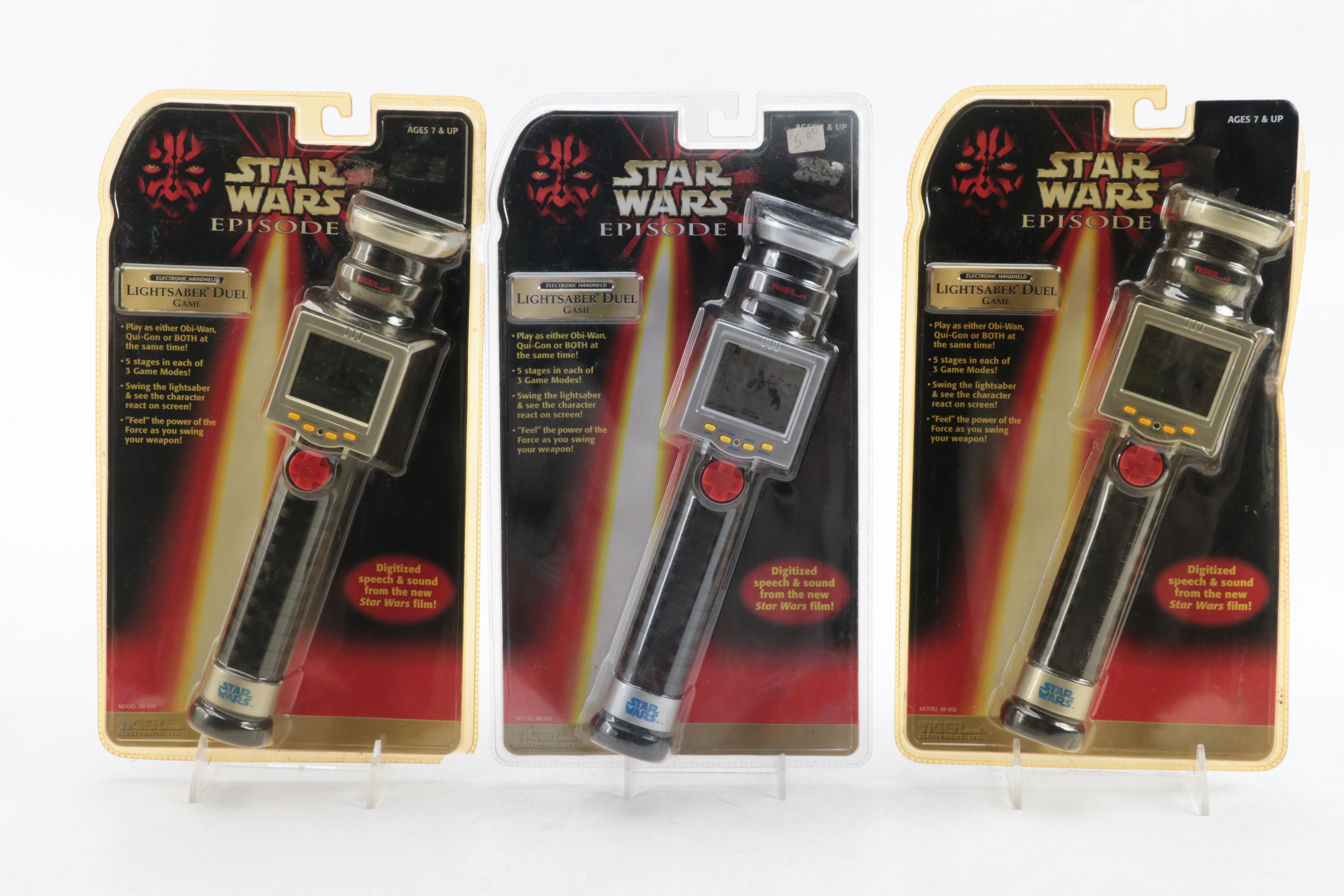 Tiger Electronics Lightsaber Duel Game and Bandai Jetfire Transformer Toy