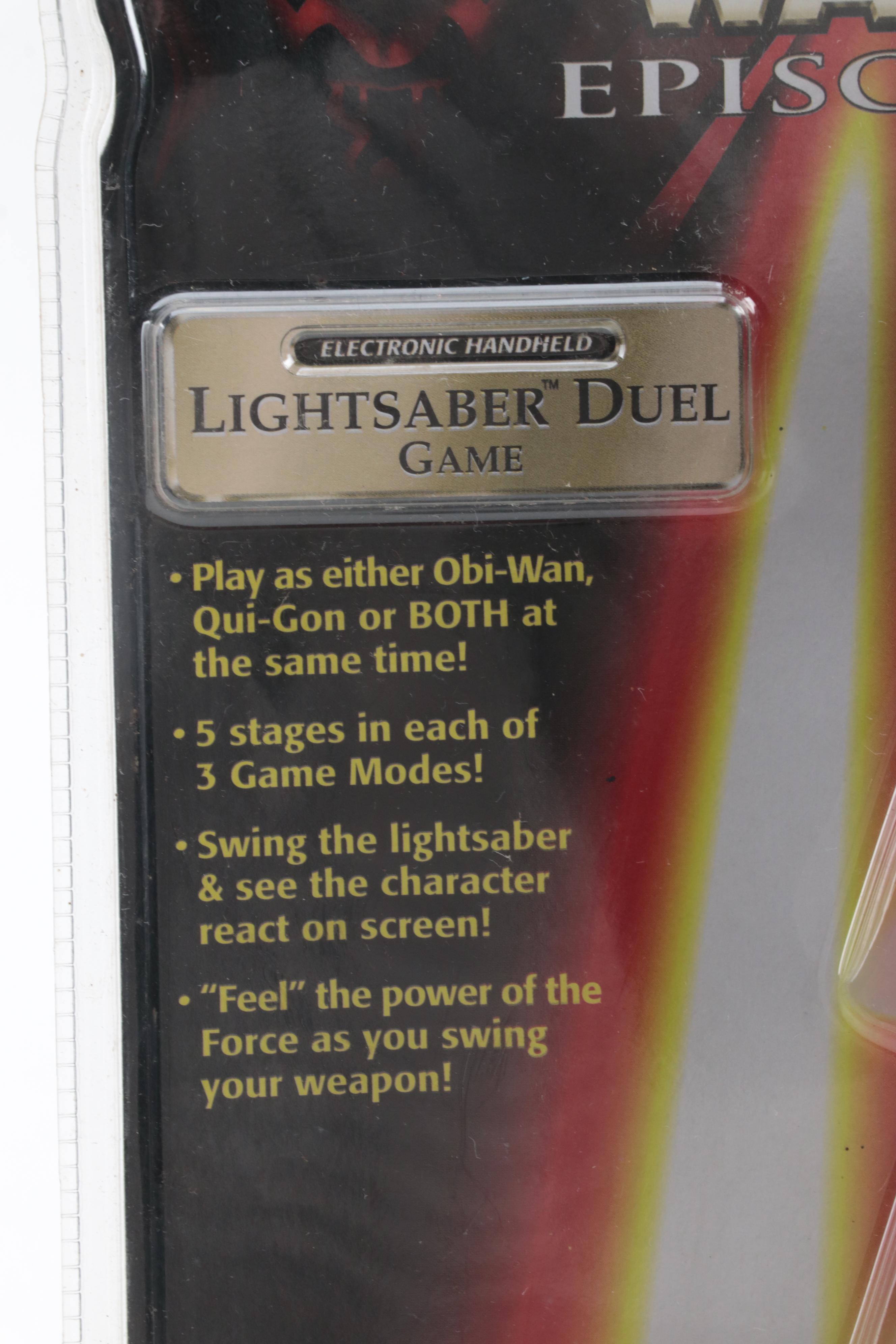 Tiger Electronics Lightsaber Duel Game and Bandai Jetfire Transformer Toy