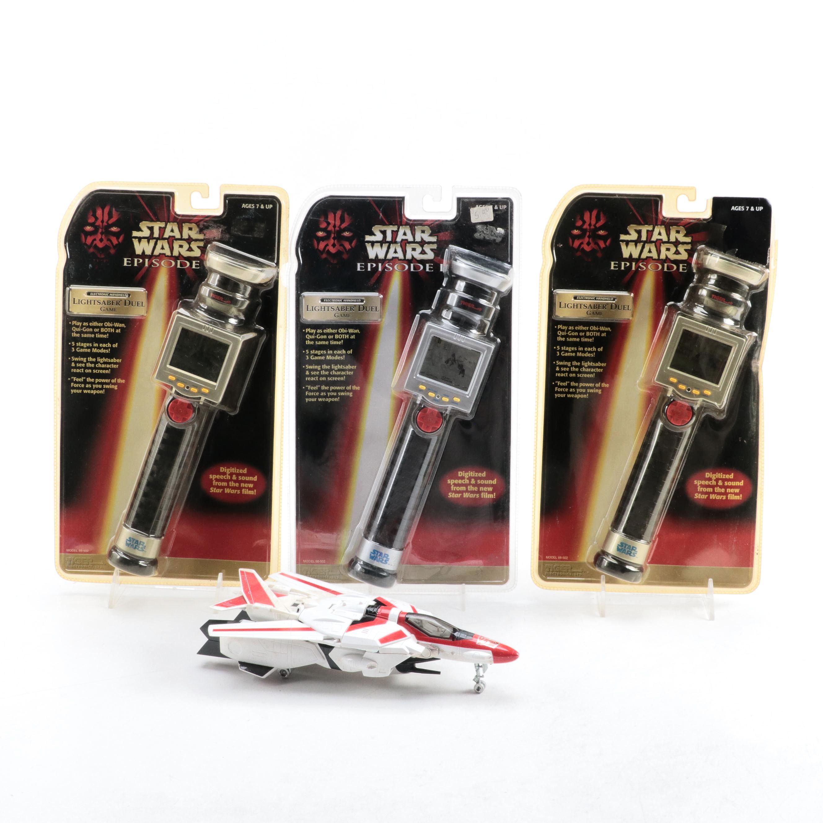 Tiger Electronics Lightsaber Duel Game and Bandai Jetfire Transformer Toy