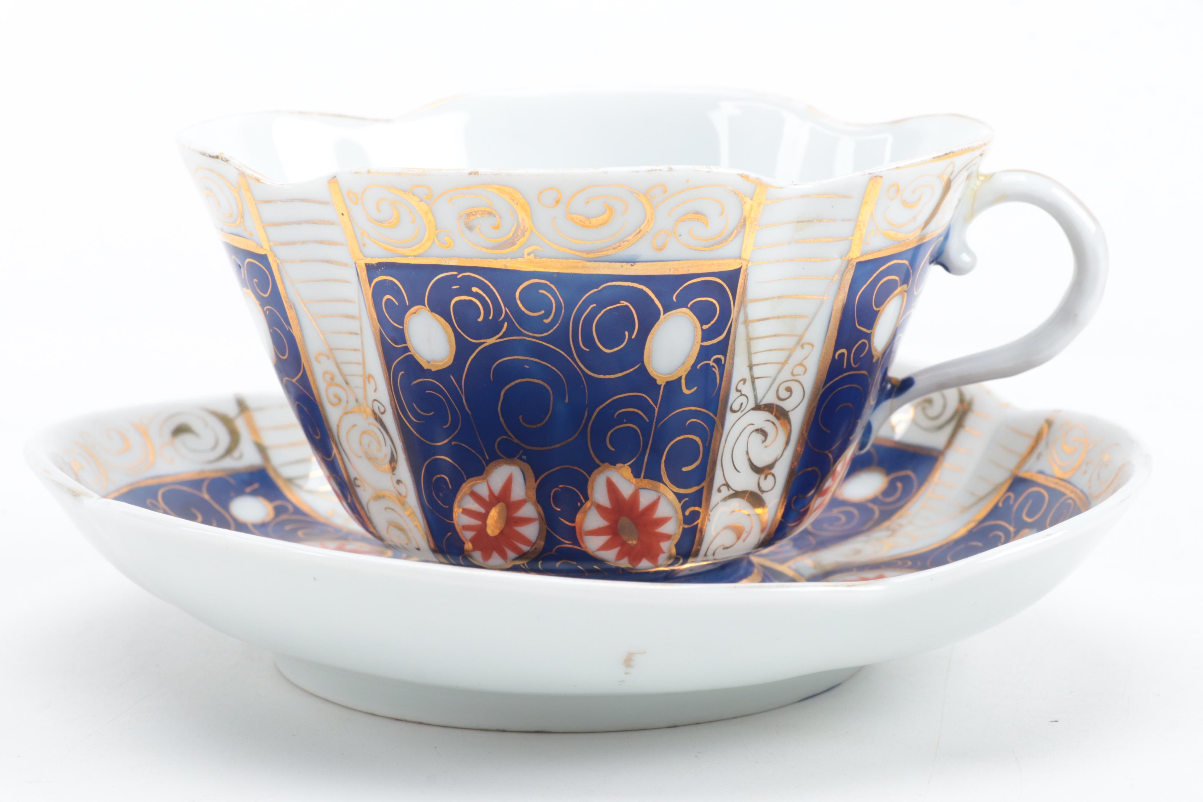 KPM Porcelain Footed Cup and Saucer with Other European Porcelain Teacups