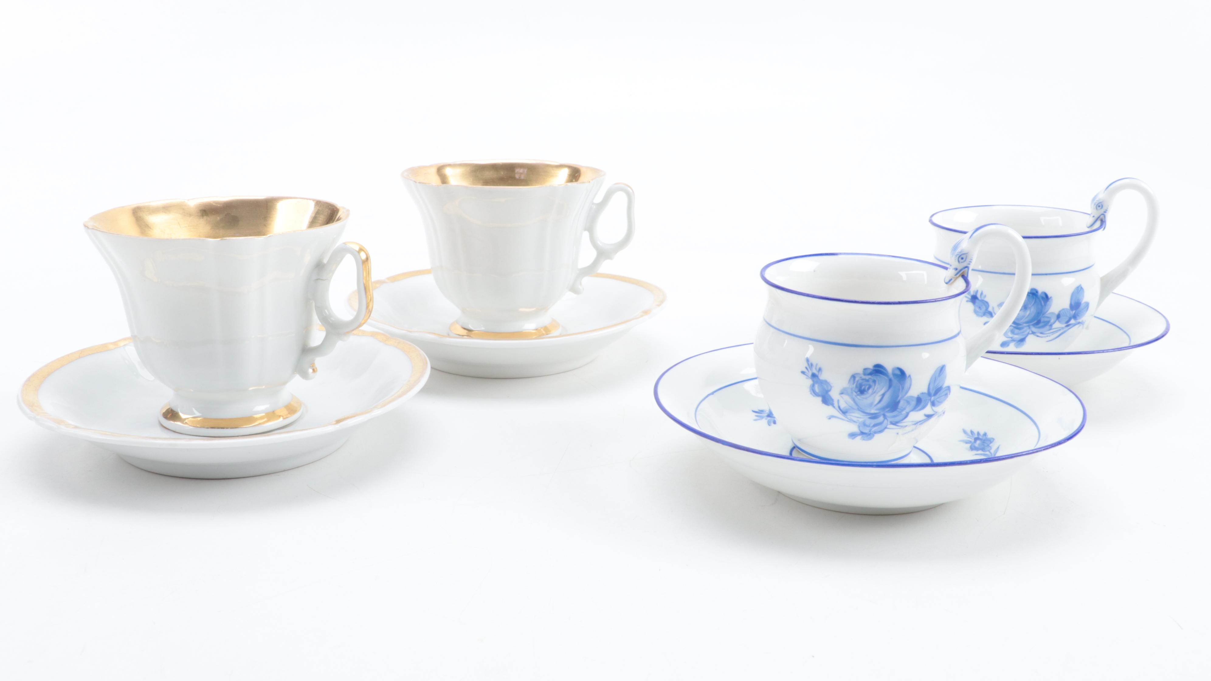 KPM Porcelain Footed Cup and Saucer with Other European Porcelain Teacups