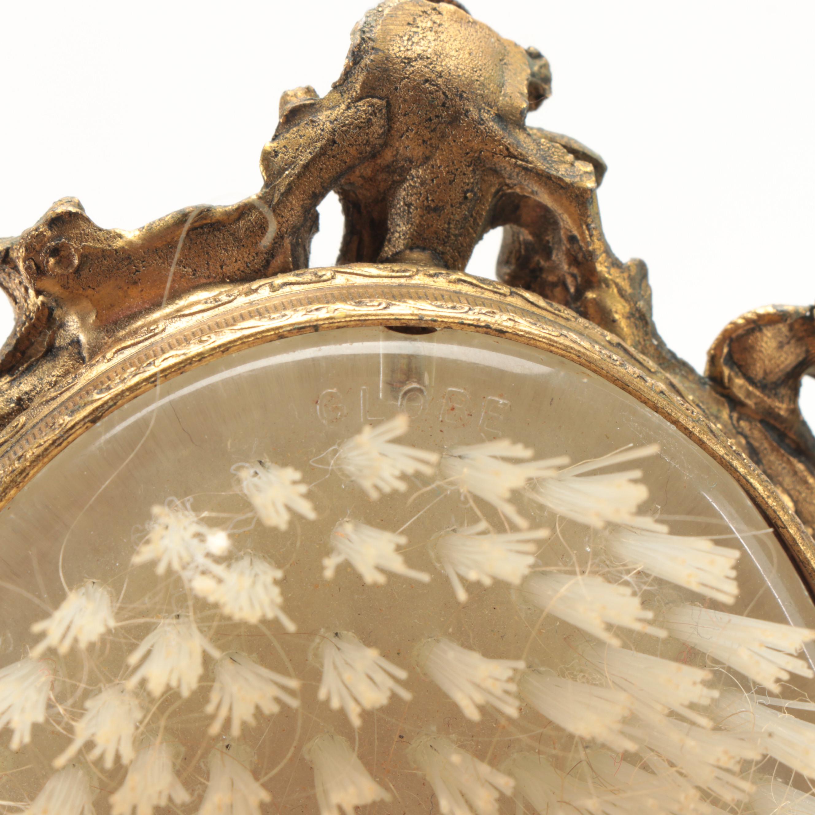 Globe Gilt Metal Beveled Glass Hand Mirror and Matching Brush