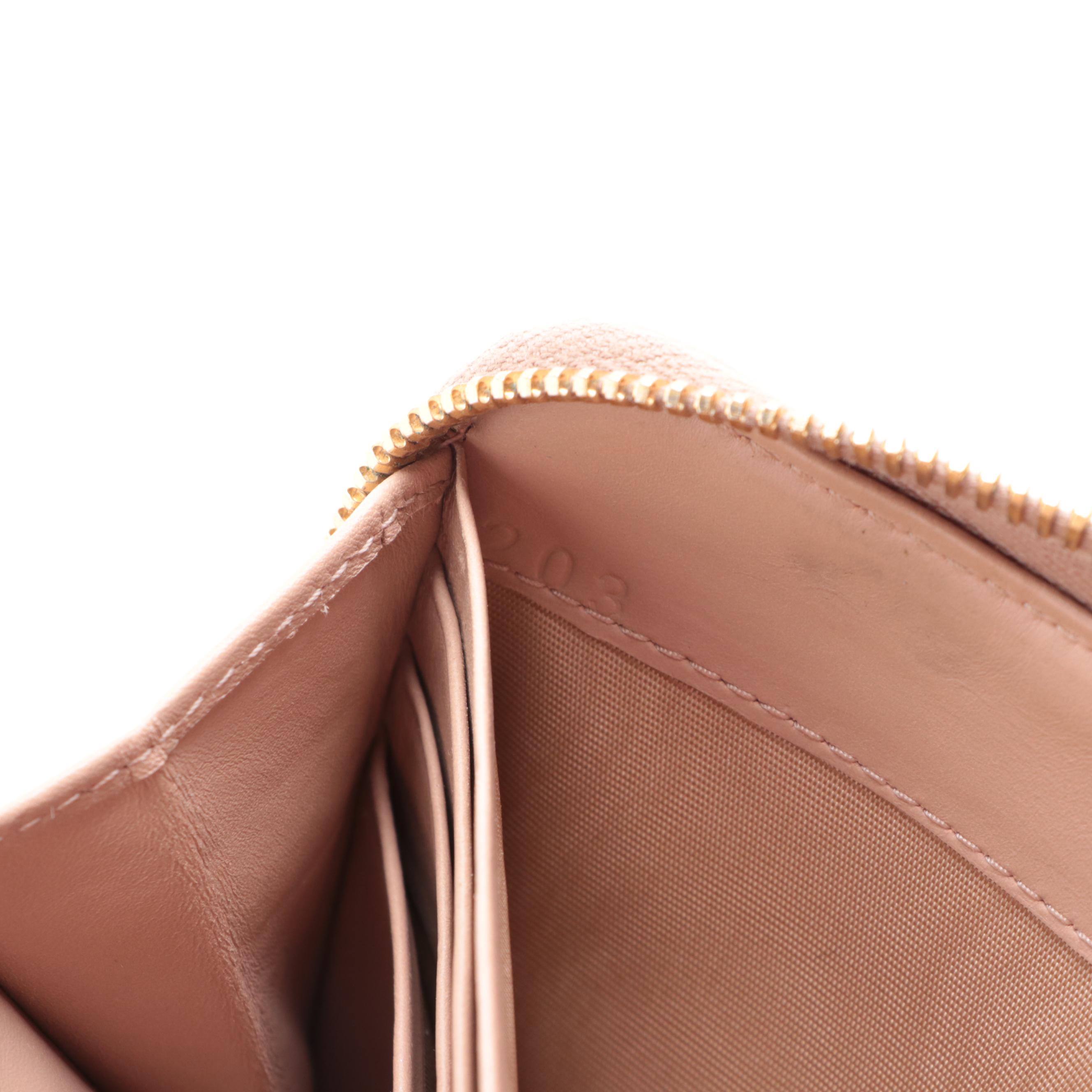 Prada Textured Leather Zip Wallet