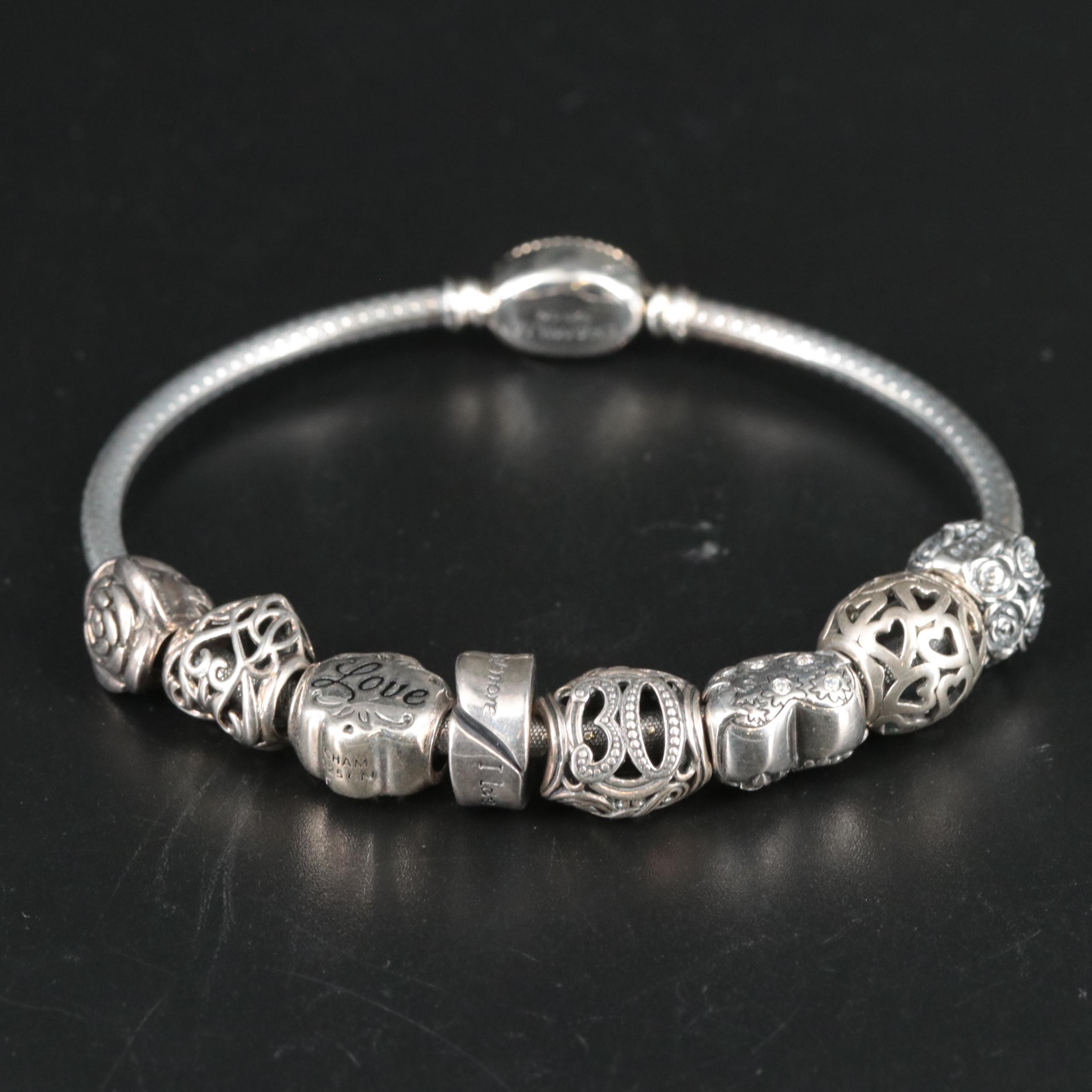 Sterling Bracelet Featuring Love Mom and Anniversary Themed Sterling Charms