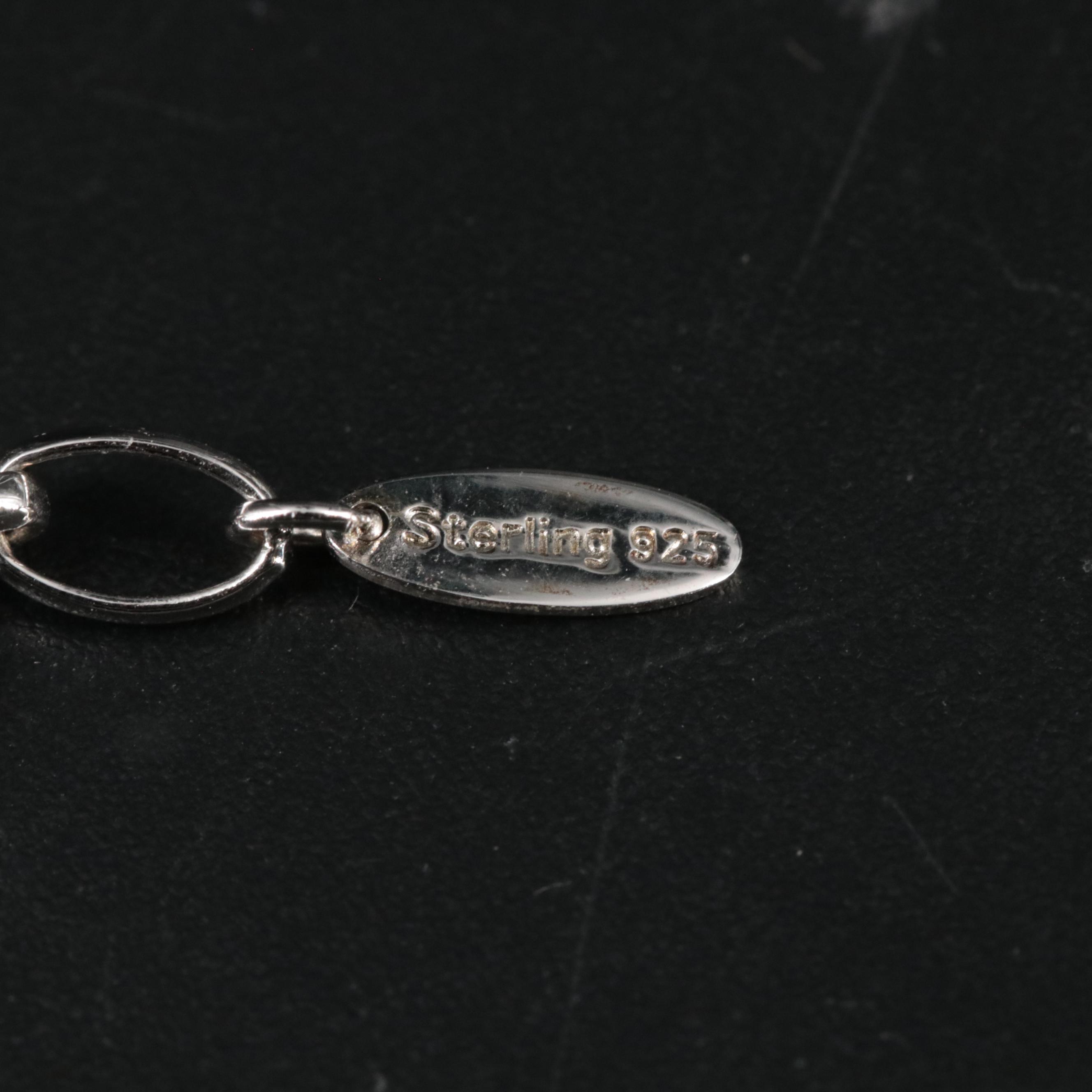 Leather Braided Bracelet Featuring "Granddaughter" and Other Charms