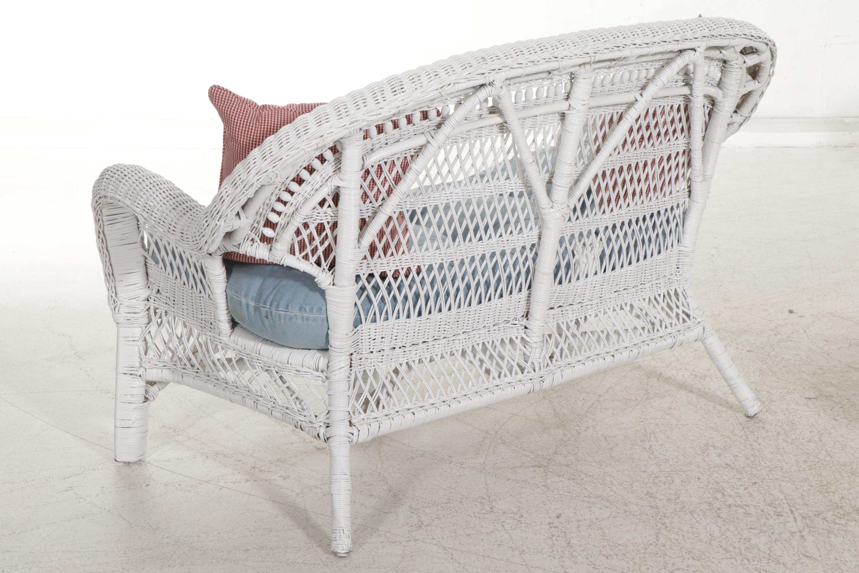 Wicker Loveseat, Armchairs and Rocker with Pottery Barn Footstools, 21st Century