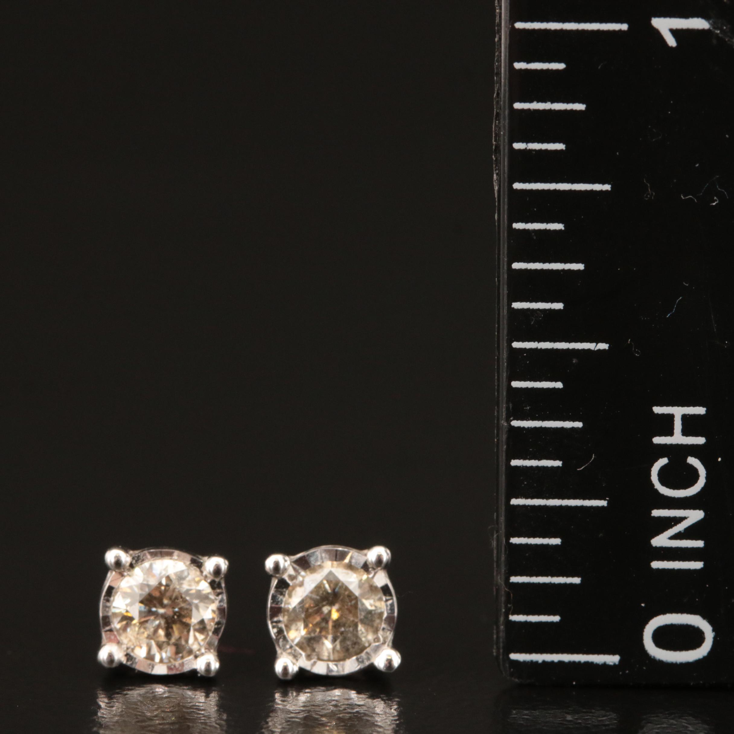 10K 0.60 CTW Diamond Stud Earrings