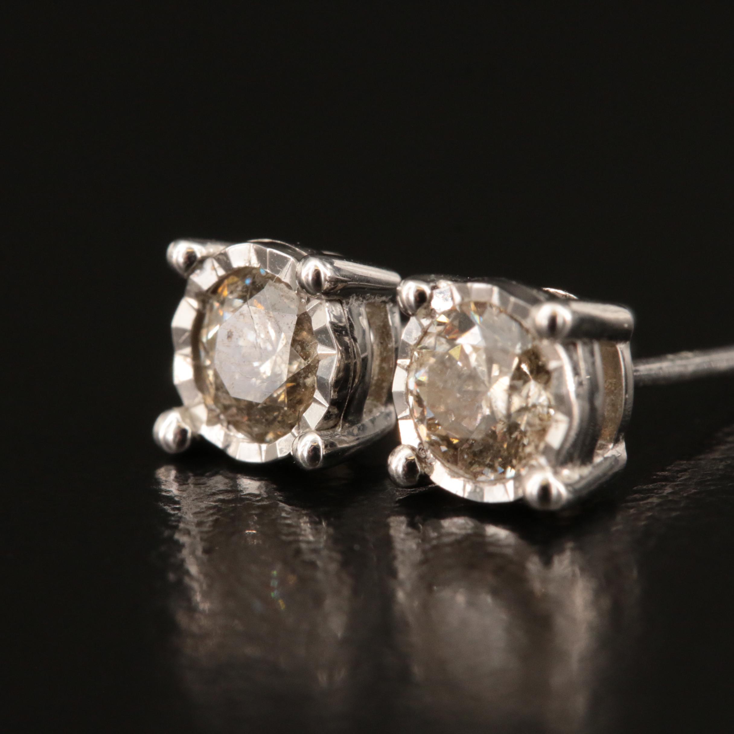10K 0.60 CTW Diamond Stud Earrings