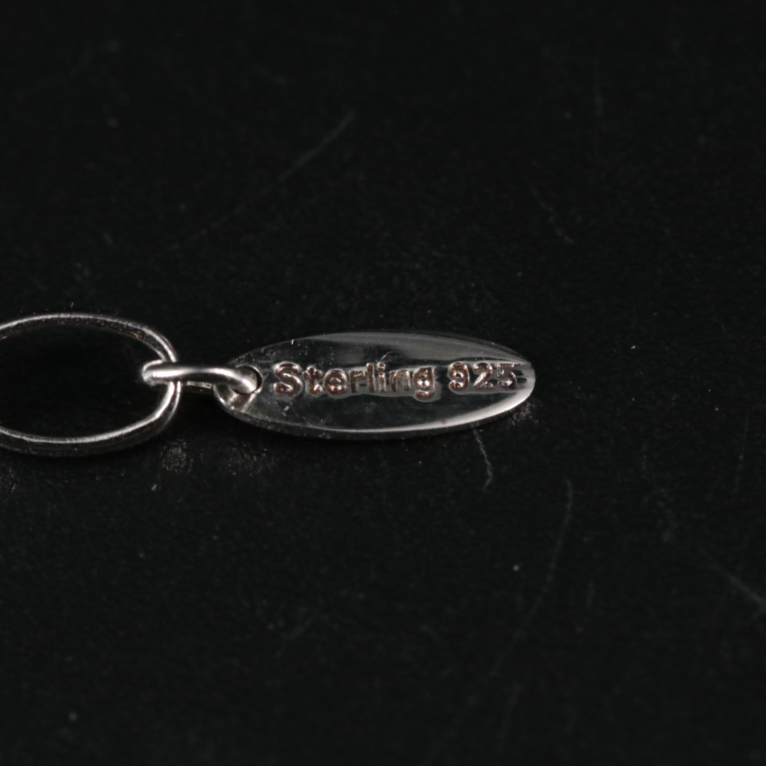 Leather Band Featuring Sterling Spring Themed Charms