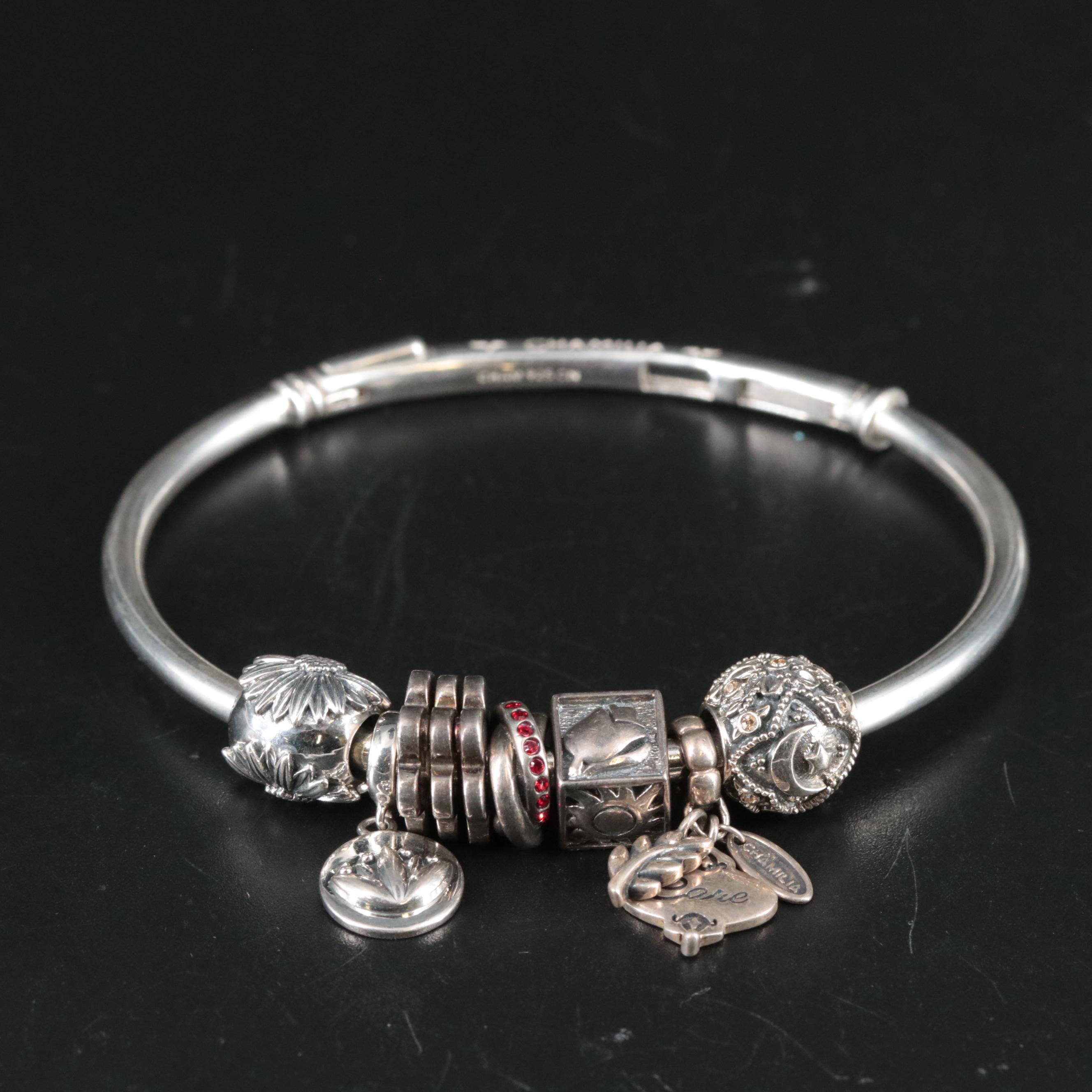 Sterling Bracelet Featuring Lotus Flower and Other Charms