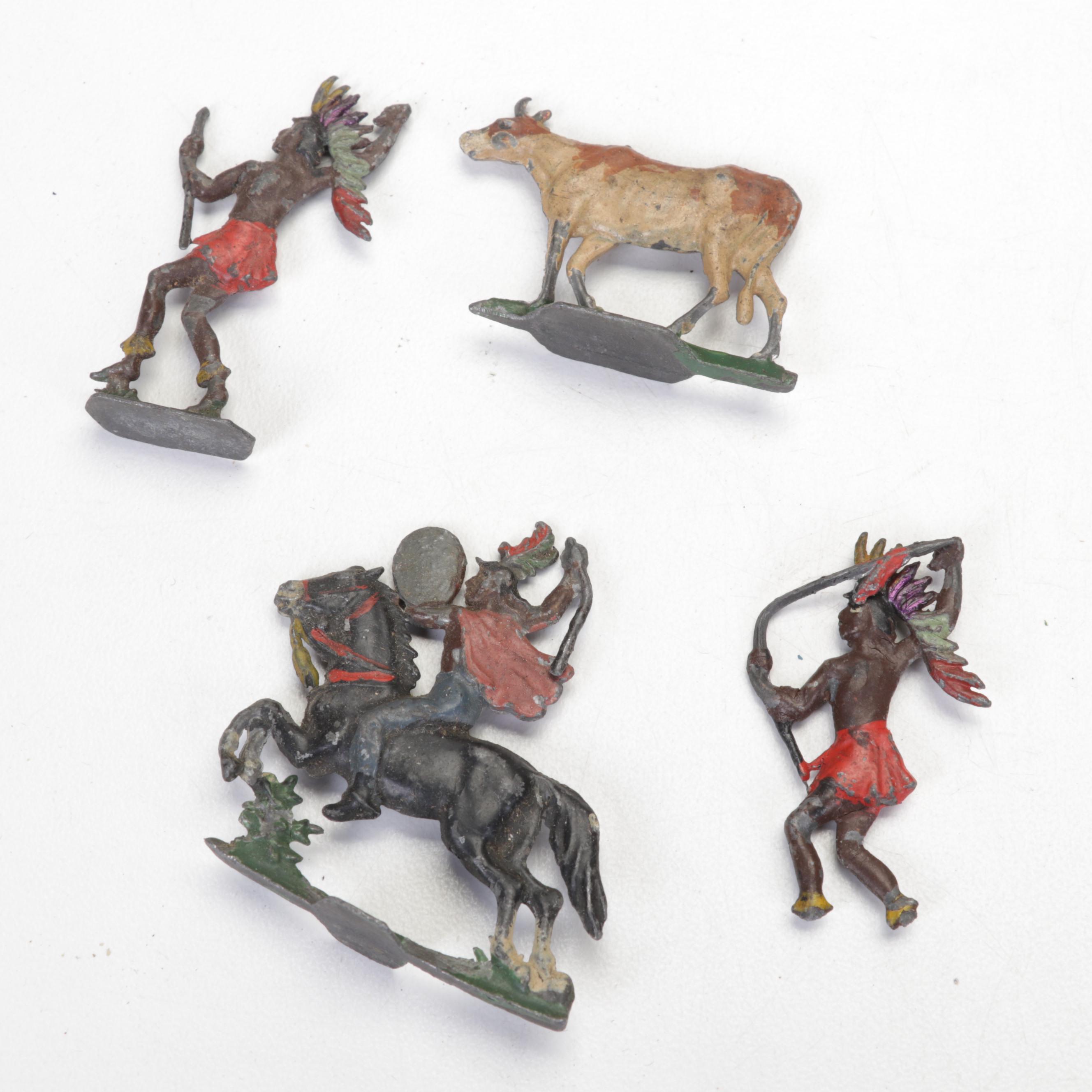 Metal Native American Toy Figurines, Marbles, VW Beetle, and More Toys and Books