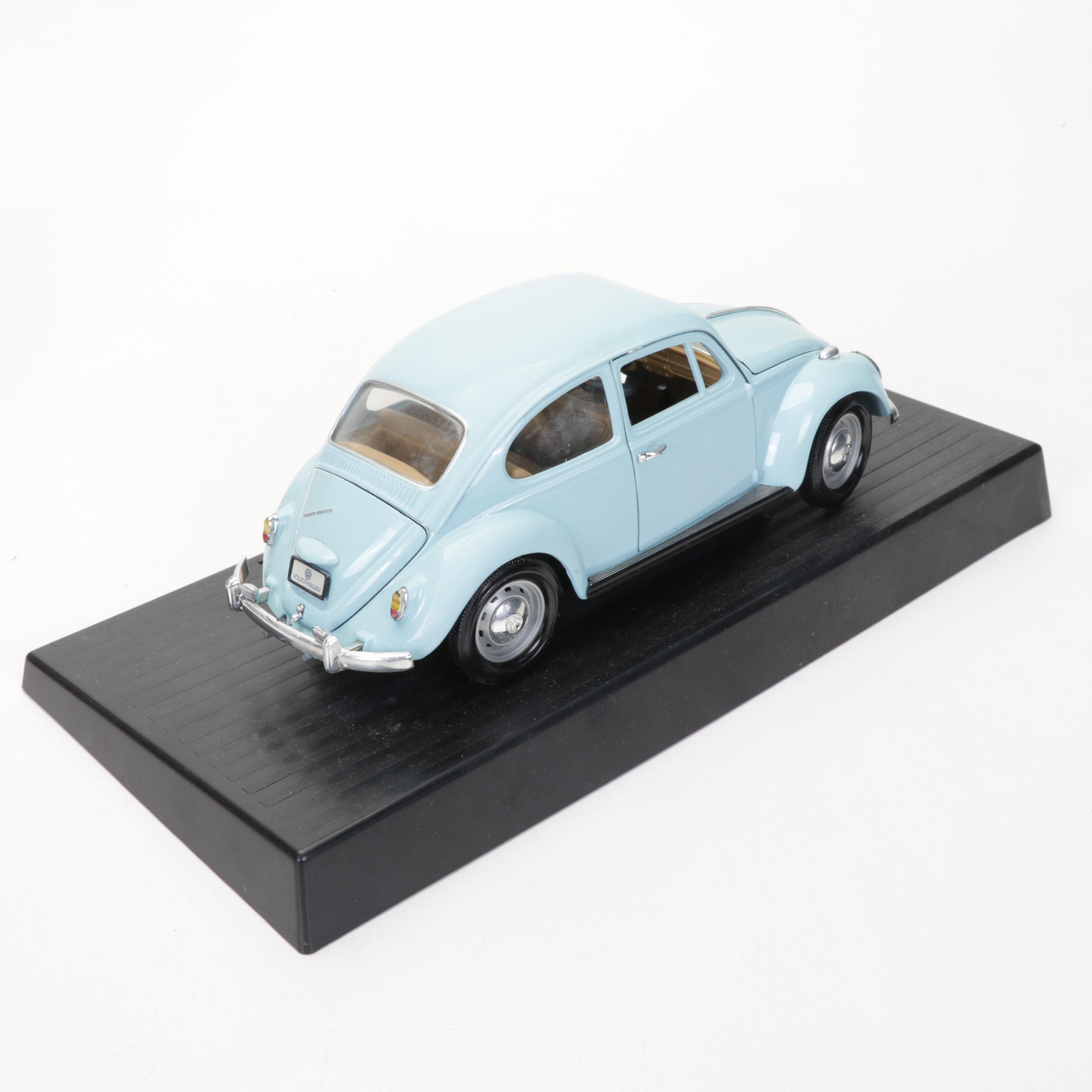 Metal Native American Toy Figurines, Marbles, VW Beetle, and More Toys and Books