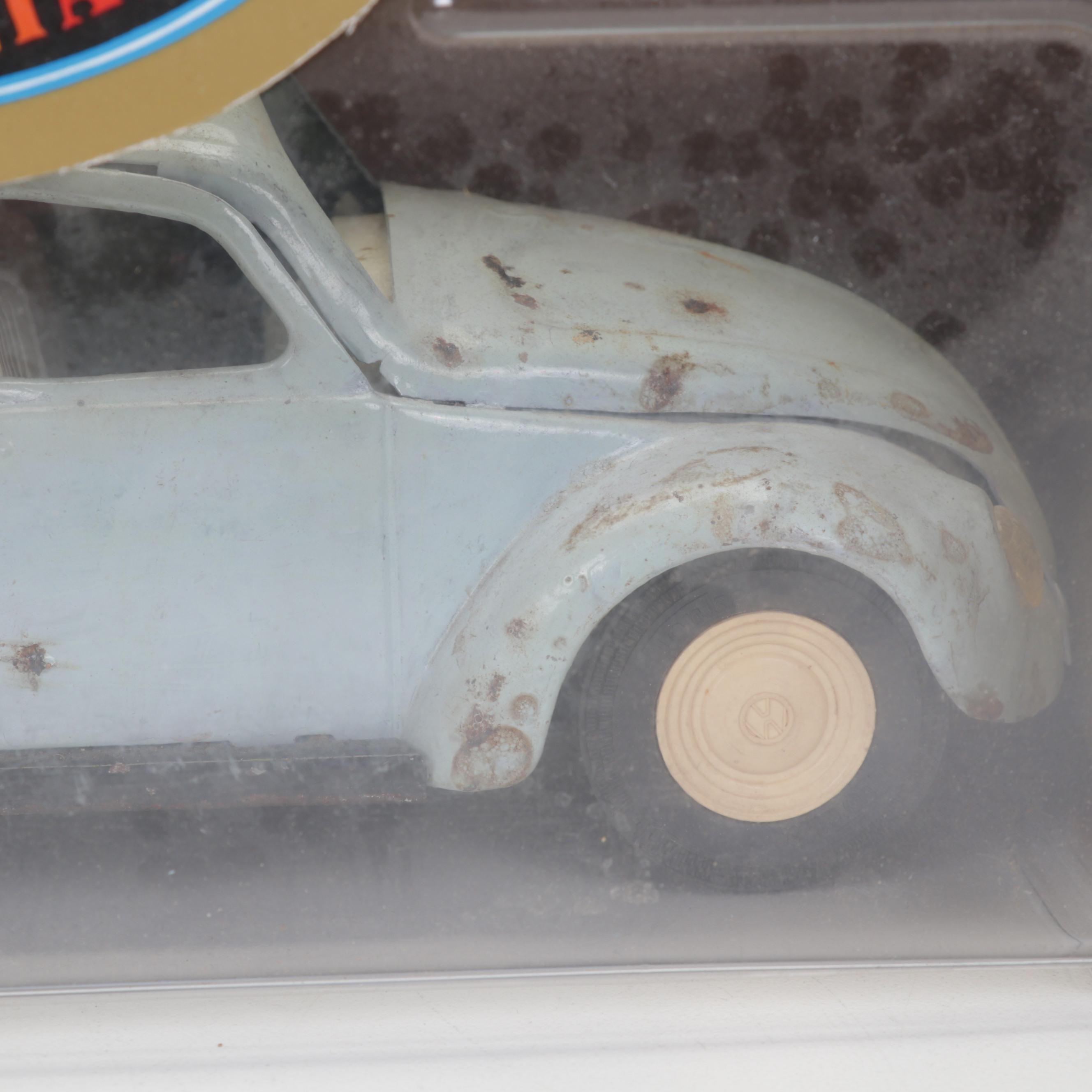 Metal Native American Toy Figurines, Marbles, VW Beetle, and More Toys and Books