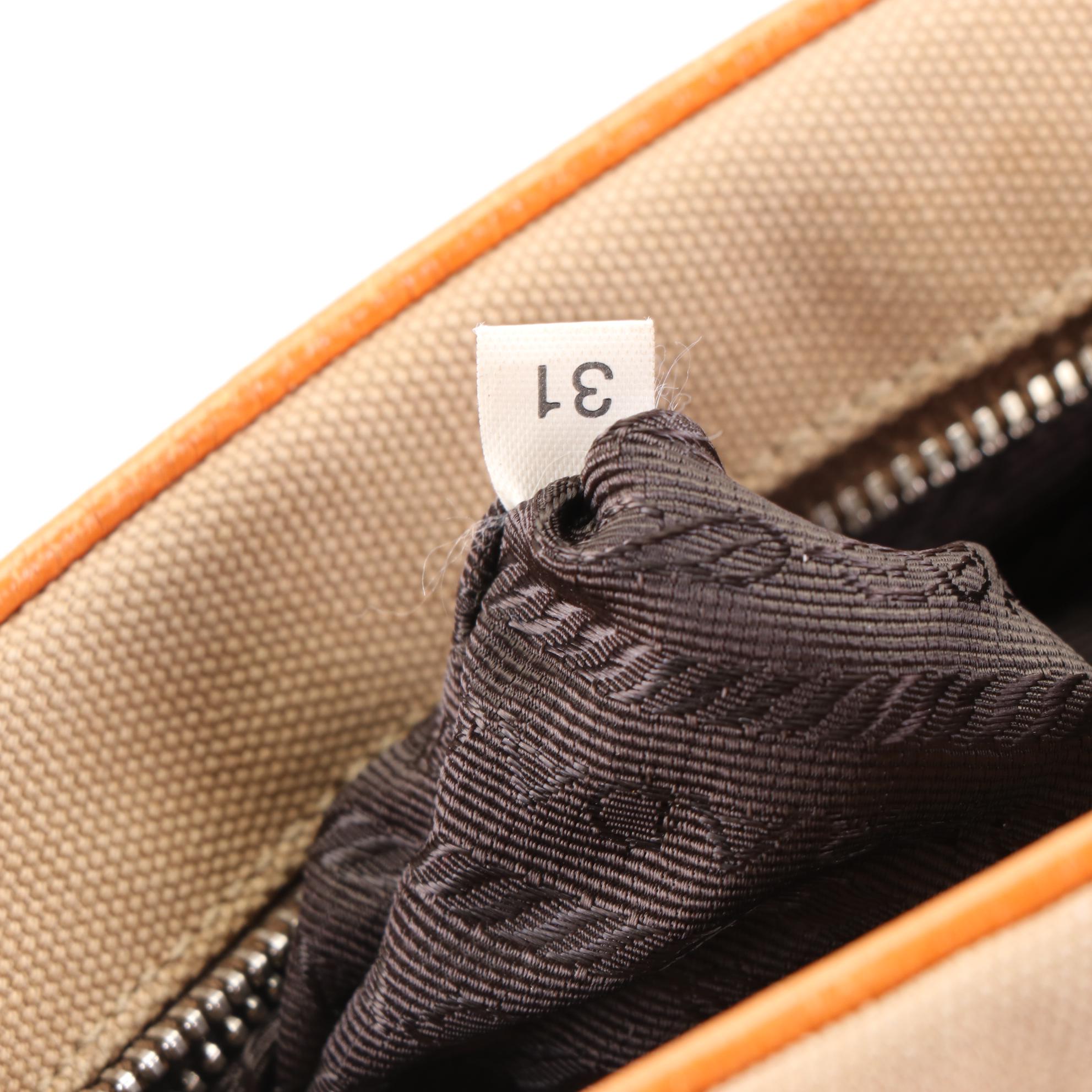 Prada Baguette in Canvas and Cinghi Leather