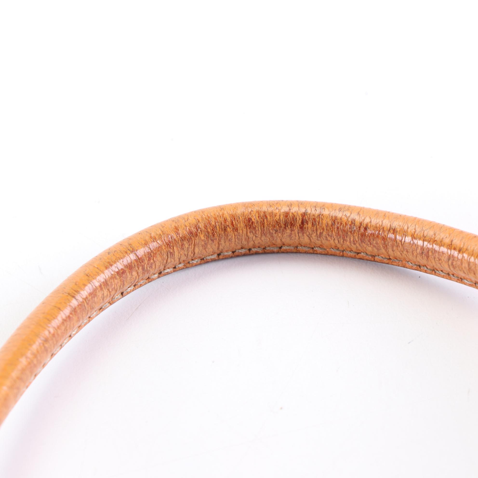 Prada Baguette in Canvas and Cinghi Leather