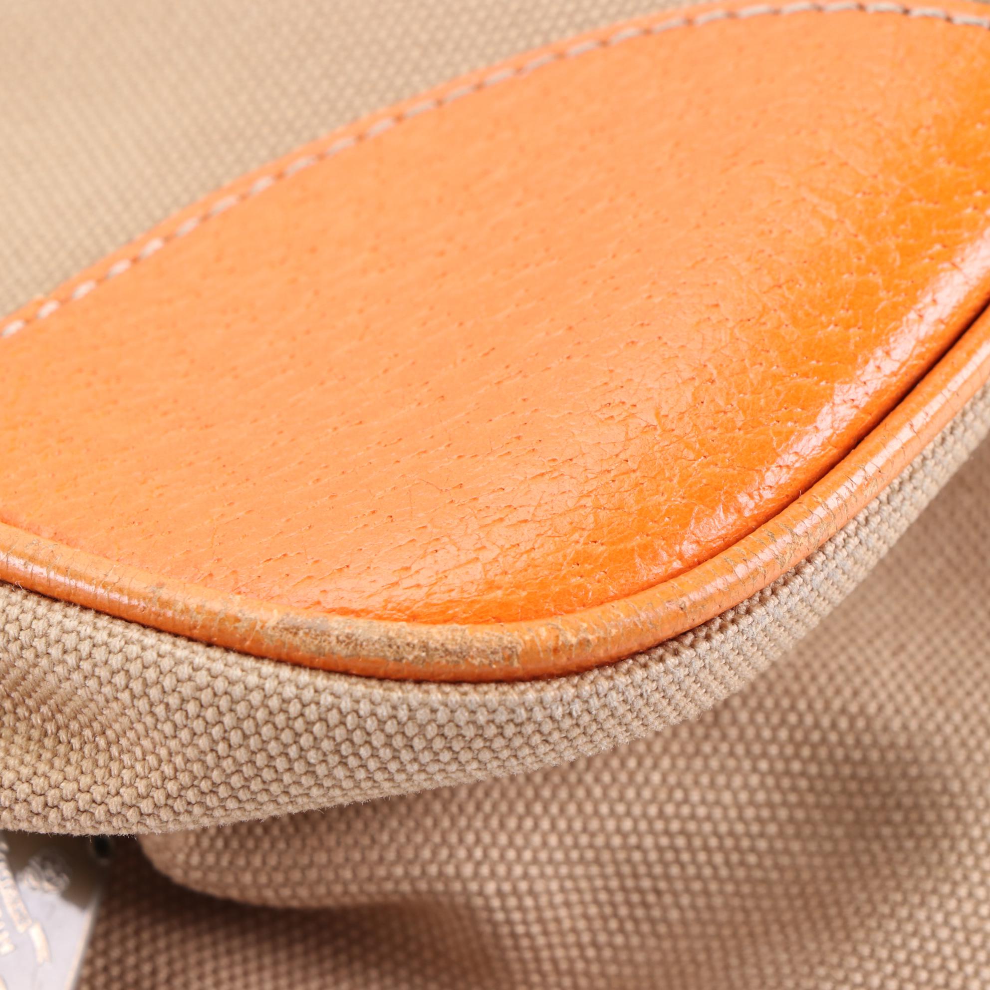 Prada Baguette in Canvas and Cinghi Leather