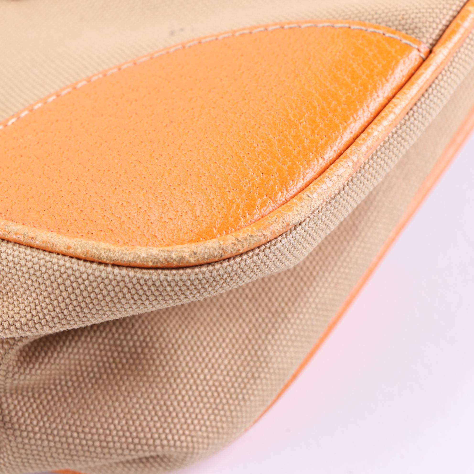 Prada Baguette in Canvas and Cinghi Leather