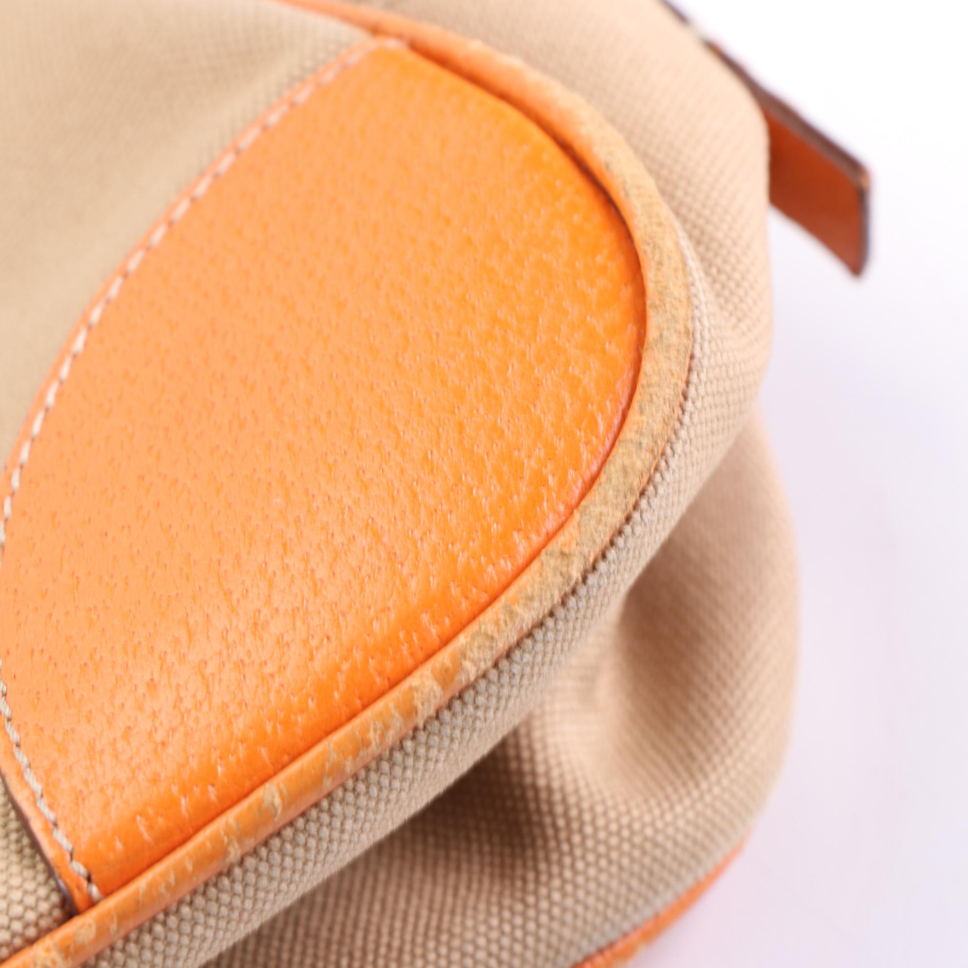 Prada Baguette in Canvas and Cinghi Leather