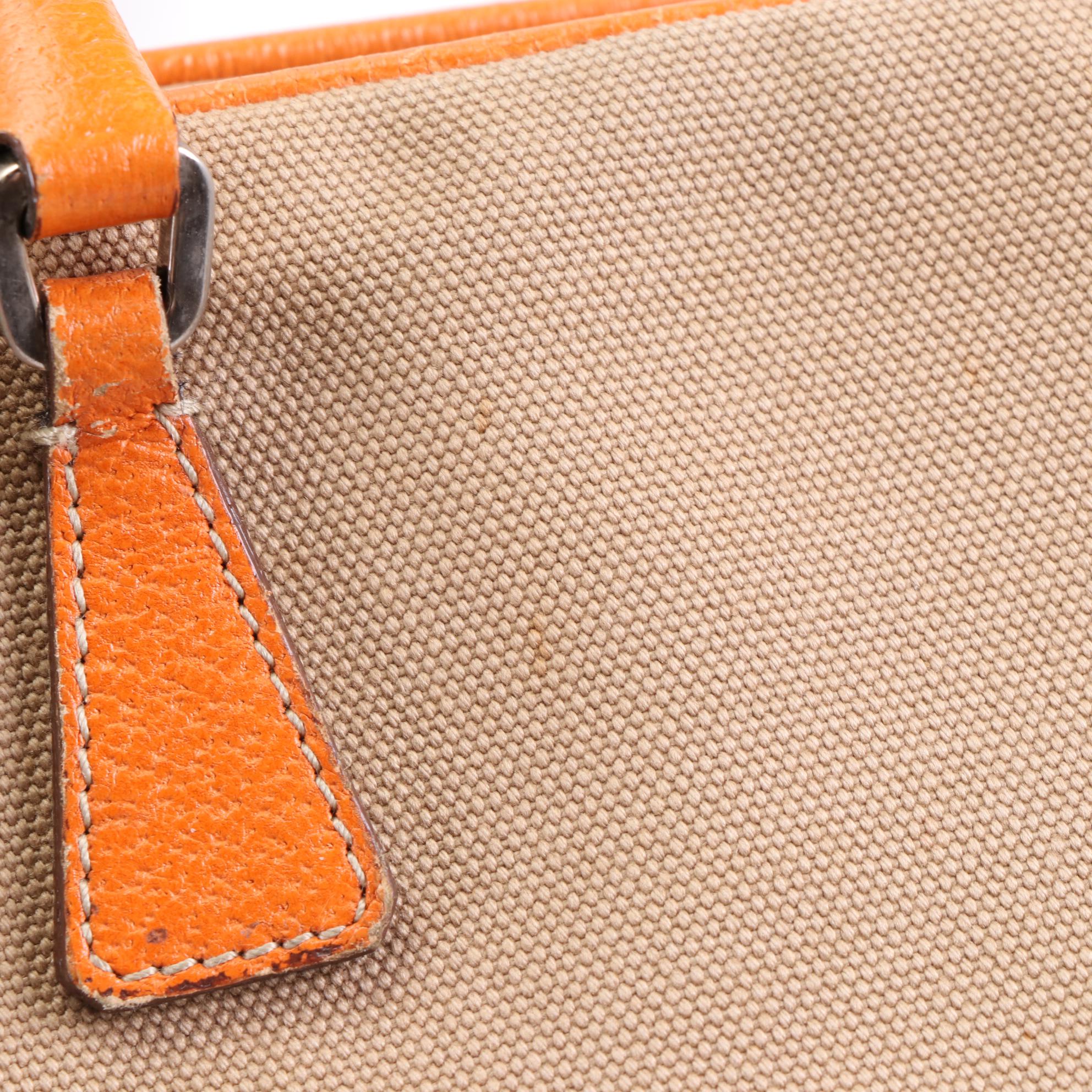 Prada Baguette in Canvas and Cinghi Leather