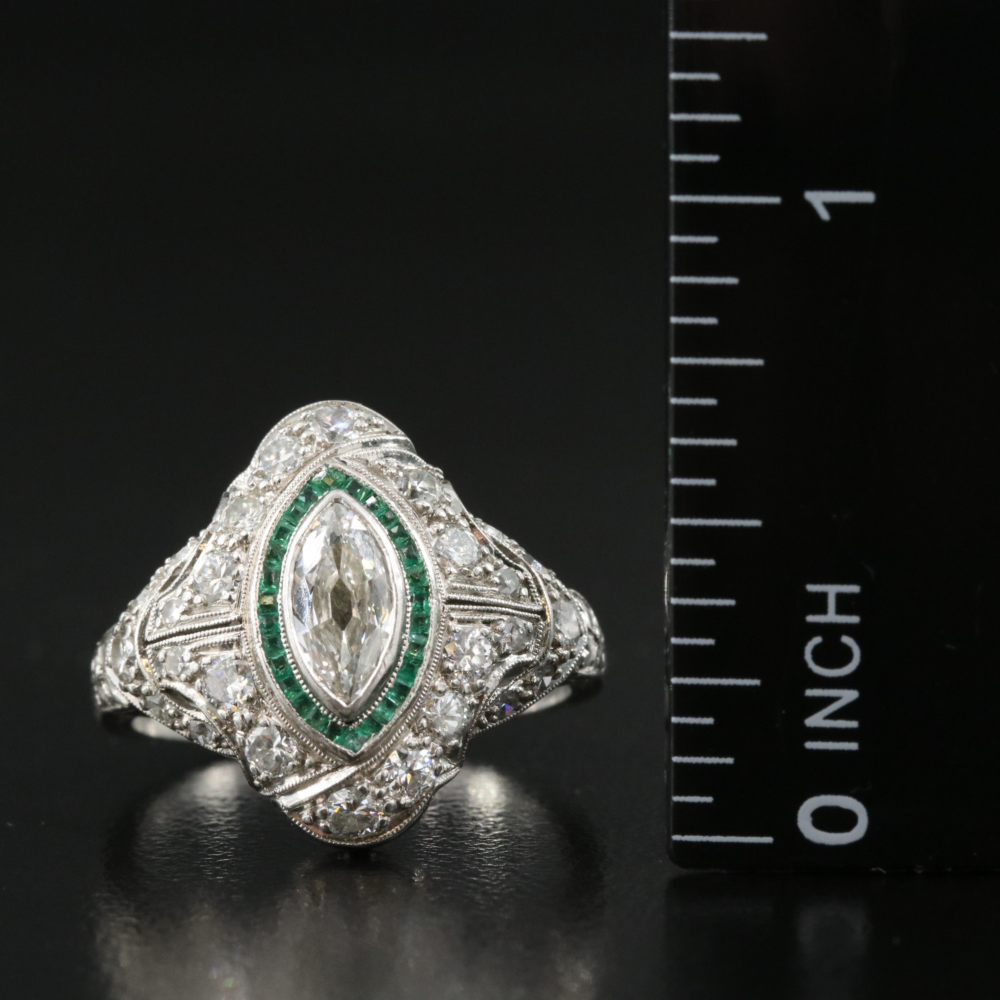 Art Deco Platinum 1.41 CTW Diamond and Emerald Bombé Ring